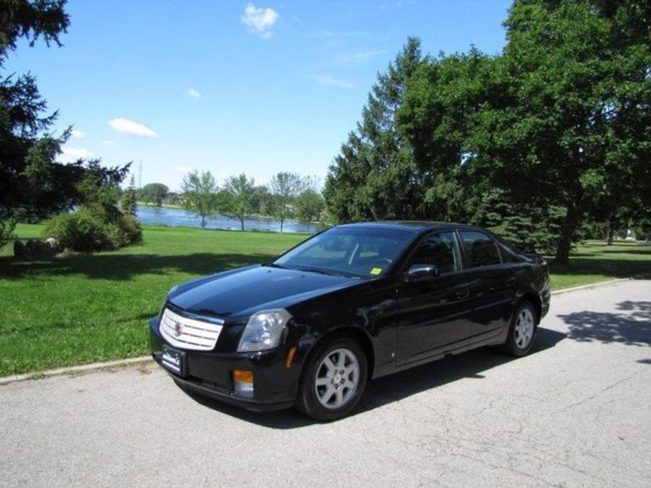 This 2007 Cadillac CTS 4dr SUNROOF!! NEW TIRES!!! GM LEASE RETURN!! Sedan features a 2.8L V6 SFI DOHC 6 cyl Gasoline engine. It is equipped with a Automatic transmission. The vehicle is Black with a Black Leather interior. It is offered with the remaining factory warranty. Over 400 BETTER used cars in stock!! PLEASE CALL 1-866-348-8146 5.99% Financing + no payments up to 6 months available on approved credit!! Free Trial Exchange!! A+ Better Business Bureau rating!! Voted Guelphs Favourite dealer 2004-2009!! Since 1961. Taxes, licensing, and $5.00 OMVIC fee are extra. Call for details on our Free Trial Exchange! Thank you for considering Wilsons!!! Please call 1-866-348-8146. - This Cadillac is in Excellent overall exterior condition, Excellent overall interior condition, Leather seats - Air Conditioning, Climate Control, Dual Zone Climate Control, Cruise Control, Power Steering, Power Windows, Power Door Locks, Power Mirrors, Leather Steering Wheel, Power Drivers Seat, Heated Seat, Clock, Tachometer, Digital Info Center, Homelink System, Tilt Steering Wheel, Steering Wheel Radio Controls, Sunroof, Driver Airbag, Passenger Airbag, Keyless Entry, ABS Brakes, Traction Control, Rear Defogger, Intermittent Wipers, AM-FM, CD Player, Alloy Wheels, Leather Interior Surface - Contact The Internet Department at 866-738-6045 or leads@markwilsonsbetterusedcarstc.dealer.com for more information. -