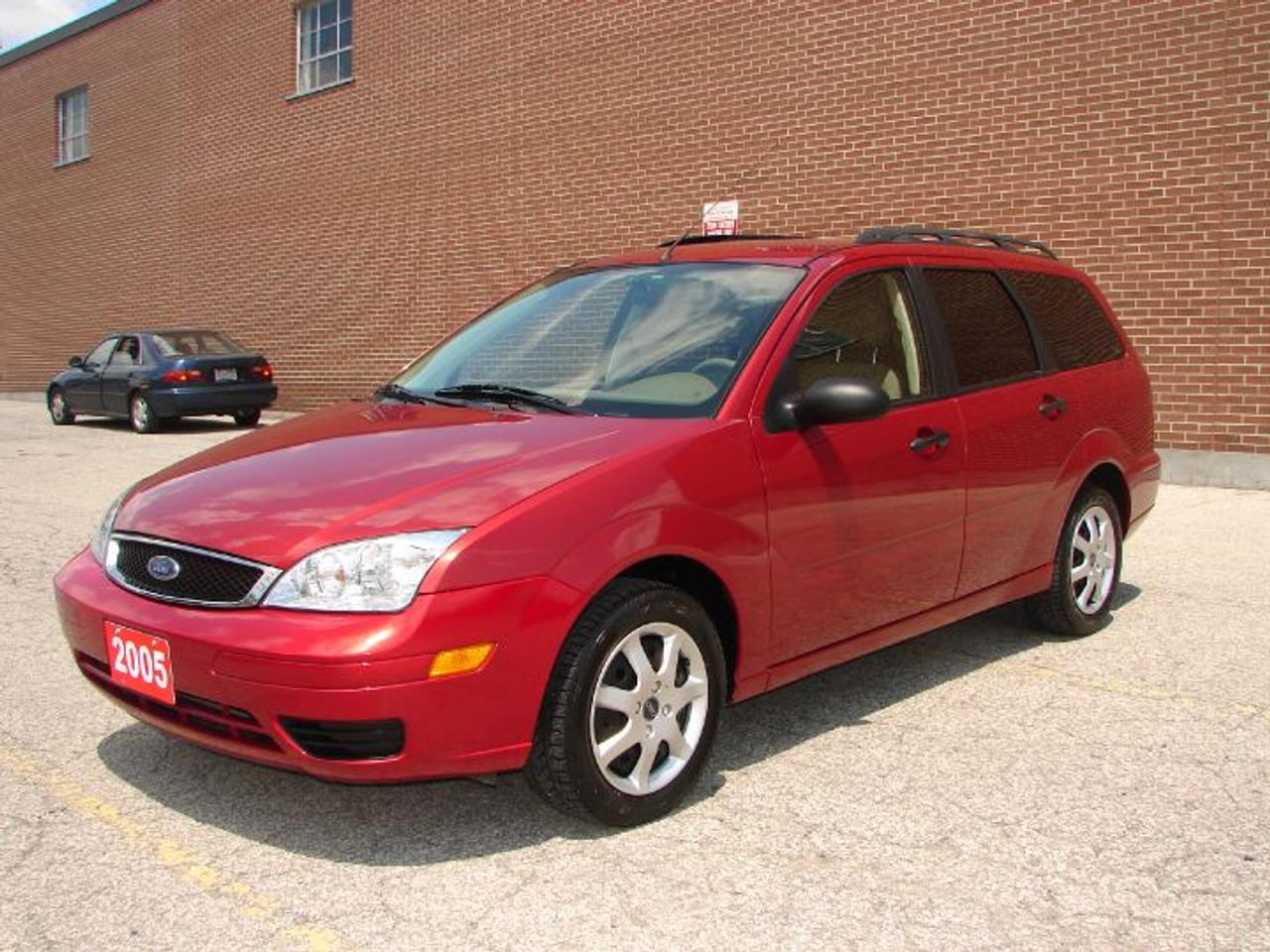 2005 Ford Focus Wagon ZXW 4cyl. 2L. REBUILT TITLE. Former U.S. vehicle in MILES. Excellent conditon in&out. Looks & drives excellent. Certified & E-tested. Call (905)271-9127. email: e-zeewheels@rogers.com. www.e-zeewheels.com