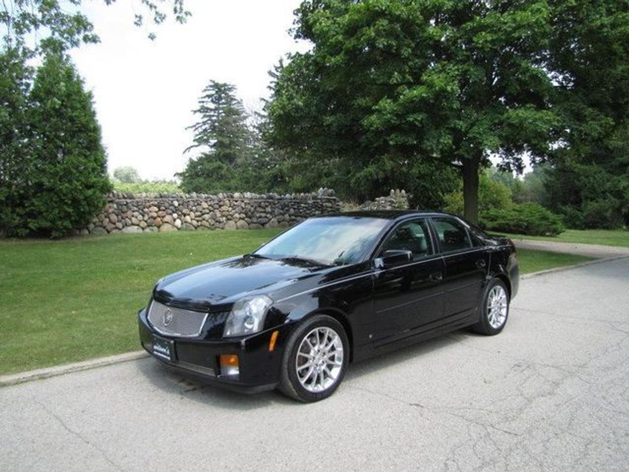 This 2007 Cadillac CTS 4dr LUXURY SPORT PKG!! NEW TIRES!!! ROOF! GM LEASE RETURN! Sedan features a 3.6L V6 SFI 6 cyl Gasoline engine. It is equipped with a Manual transmission. The vehicle is Black with a Ebony Leather interior. It is offered with the remaining factory warranty. Over 400 BETTER used cars in stock!! PLEASE CALL 1-866-348-8146 5.99% Financing + no payments up to 6 months available on approved credit!! Free Trial Exchange!! A+ Better Business Bureau rating!! Voted Guelphs Favourite dealer 2004-2009!! Since 1961. Taxes, licensing, and $5.00 OMVIC fee are extra. Call for details on our Free Trial Exchange! Thank you for considering Wilsons!!! Please call 1-866-348-8146. - This Cadillac is in Excellent overall exterior condition, Excellent overall interior condition, Leather seats - Air Conditioning, Climate Control, Dual Zone Climate Control, Cruise Control, Power Steering, Power Windows, Power Door Locks, Power Mirrors, Leather Steering Wheel, Power Drivers Seat, Power Passenger Seat, Heated Seat, Wood Trim, Clock, Tachometer, Digital Info Center, Homelink System, Tilt Steering Wheel, Telescoping Steering Wheel, Steering Wheel Radio Controls, Sunroof, Driver Airbag, Passenger Airbag, Keyless Entry, ABS Brakes, Traction Control, Rear Defogger, Fog Lights, Intermittent Wipers, AM-FM, CD Player, Aluminum Wheels, Sport Package, Leather Interior Surface, Xenon, OnStar, Premium Wheels, Luxury Seats - Contact The Internet Department at 866-738-6045 or leads@markwilsonsbetterusedcarstc.dealer.com for more information. -