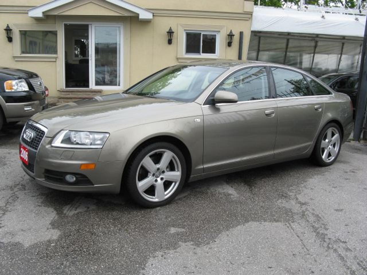 Carproof Clean, 1 owner from Audi Canada, Automatic tiptronic, 3.2L 6cyl., air cond., ABS, dual air bags, tilt, cruise, AM/FM CD. Fully loaded, leather int., p/heated seats, navigation, wood trim, traction control, xenon lights, keyless entry and 18alum rims. Only 78,000 kms. $23,995 $7000 down $395/mth tax-included. Balance of factory warranty. Mint cond. Sale priced. Bronze ext on black leather interior. Call today. Price does not include certification or e-test. (cert & e-test are available for $495 extra)