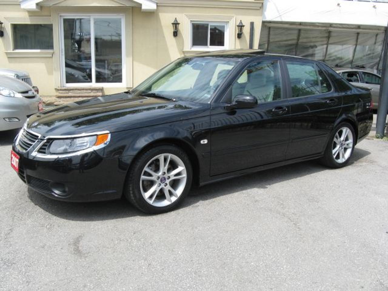 Carproof Clean, 1 owner from Saab Canada, Automatic tiptronic, 2.3L 4 cyl. turbo, air cond., ABS, air bags, tilt, cruise, AM/FM CD/AUX. Fully loaded, p/sunroof, leather int., p/seats, keyless entry, park sensors, xenon lights and 17alum rims. Only 76,000 kms. $16,995 $4000 down $295/mth tax-included. Balance of factory warranty. Mint cond. Sale priced. Black ext on tan leather interior. Call today. Price does not include certification or e-test. (cert & e-test are available for $495 extra)