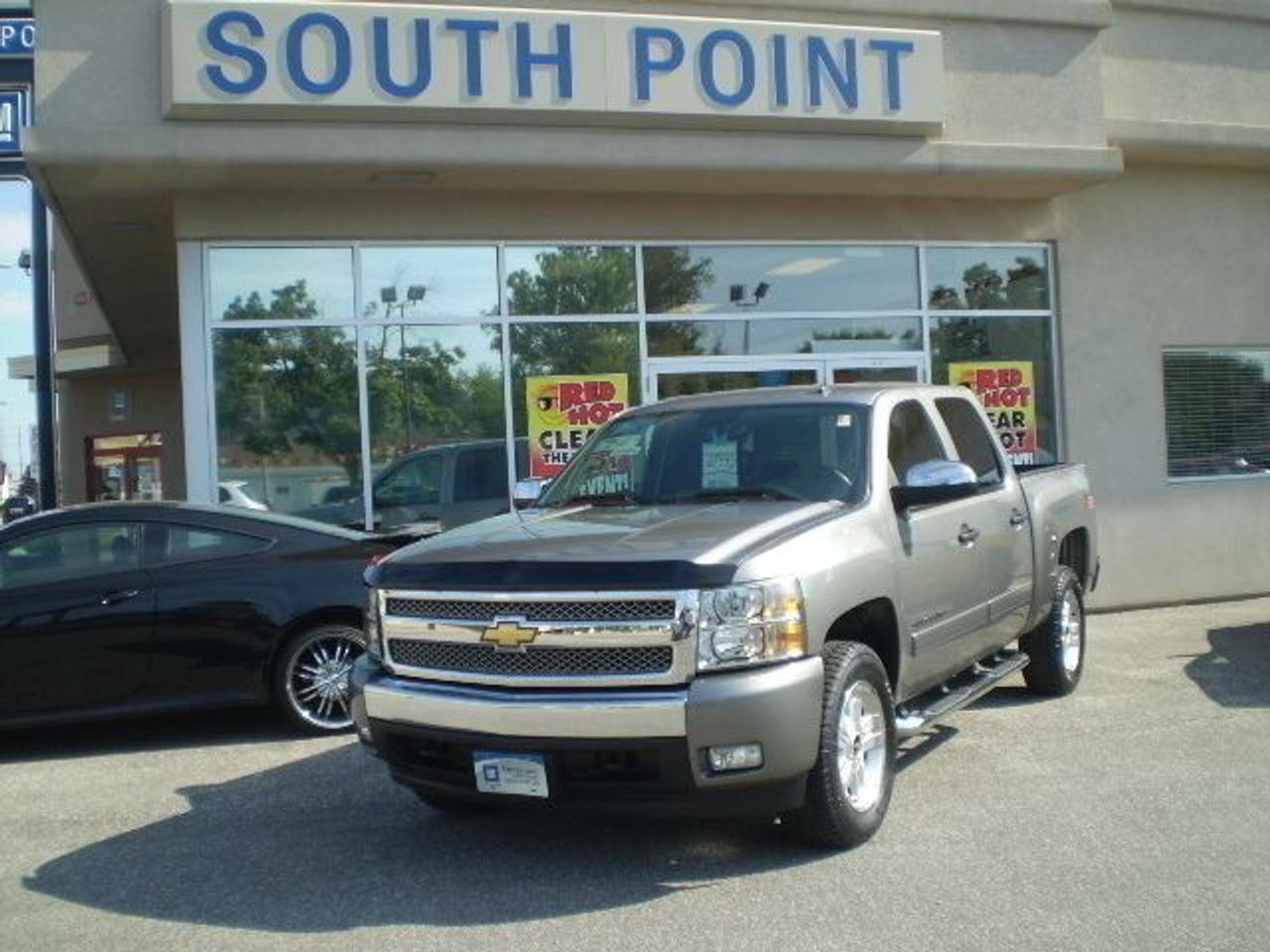 SLE. crew cab with only 57,000km, 5300 V8, dual power seats. fog lamps, climate controlled air and step tubes. Sale Price was $27995 now $26995.  OVER 100 USED available WITH PICTURES at www.southpointgm.com .  Call us at 519-326-3206 or 1-866-340-1406.  H.S.T. extra.