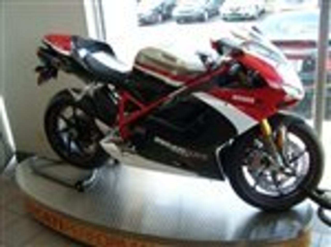 Description: 2010 Ducati 1198S CORSE EDITION with Termignoni exhaust !!!! NEW, SUMMER SALE NOW ON !!!! CALL FOR PRICE $$ 1800 9991209 $$$ *** Only @ Ducati Oakville. Mon./Thurs 9:00am to 8:00pm Fri./Sat. 9:00 am to 6:00 pm. Over 40-50 new and pre-owned bikes on display. Carrying a full line of Ducati parts, accessories, apparal , gear and performance parts. 20 minutes from the CN tower. QEW  west  past Trafalgar Square, at The Bronte Rd exit, turn into Piazza Ducati. Easy Financing available. trades possible , Your GTA West End Ducati Dealer. Best in Ducati Service. Quick turn around. Make it your destination today.   Benvenuti Vi Aspettiamo. 416 410 9465. 1800 999 1209 sales@peninsulaimports.com   call today  www.peninsulaimports.com