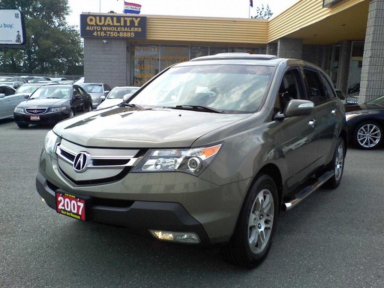 NO EXTRA FEES! FREE DUAL DVD ON THE HEADRESTS! FREE ONE YEAR-UNLIMITED KILOMETERS POWER TRAIN WARRANTY! 90k, Pearl Grey on Black Leather Interior, Navigation, Rear View Camera, Power Sunroof, 18\ Alloy Wheels, Running Boards, 7 Passengers, Power/Heated/Memory Seats, BOSE Stereo, CD Changer, Auto, Dual Climate Control, Xenon Headligts, Fully Loaded! All vehicles offered for sale are Retail.Taxes are not included. <br /><br />Free GPS or Head rest DVD with finance deals only(O.A.C).Installation charges Extra. <br />Free GPS/DVD is valid only for Finance Deals based on Full Asking Price.