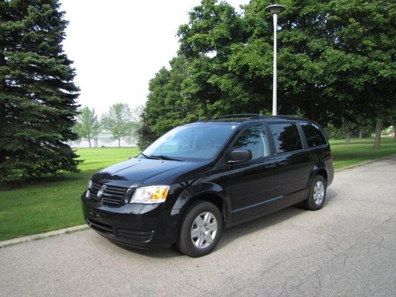 This 2010 Dodge Grand Caravan SE STOW&GO!! QUADS!! DUAL AC!! Van features a 3.3L cyl Gasoline engine. It is equipped with a Automatic transmission. The vehicle is Black with a Grey Cloth interior. It is offered with the remaining factory warranty. Over 400 BETTER used cars in stock!! PLEASE CALL 1-866-348-8146 5.99% Financing + no payments up to 6 months available on approved credit!! Free Trial Exchange!! A+ Better Business Bureau rating!! Voted Guelphs Favourite dealer 2004-2009!! Since 1961. Taxes, licensing and $5.00 OMVIC fee are extra. Former daily rental. Call for details on our Free Trial Exchange! Thank you for considering Wilsons!!! Please call 1-866-348-8146. - This Dodge is in Excellent overall exterior condition, Excellent overall interior condition, Cloth seats - Air Conditioning, Climate Control, Cruise Control, Power Steering, Power Windows, Power Door Locks, Power Mirrors, Roof Rack, Rear Air Conditioning, Clock, Digital Info Center, Tilt Steering Wheel, Driver Airbag, Passenger Airbag, Keyless Entry, ABS Brakes, Traction Control, Rear Defogger, AM-FM, CD Player, Wheels, Cloth Interior Surface, Aux. Audio Input - Contact The Internet Department at 866-738-6045 or leads@markwilsonsbetterusedcarstc.dealer.com for more information. -