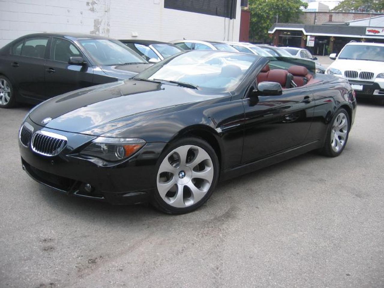 Car Proof Verified,No Claim,Sapphire Black,Chateau Dakota Leather,Auto,Navigation,Heads Up Display,Bmw Logic 7 Harman Kardon Sound System,Memory Seats,Heated Seats,Cd Changer,Home Link,19 Alloy Wheels,Park Assist,Traction,TPM,Adaptive Bi xenon Head Lights.Sales Tax are Extra.