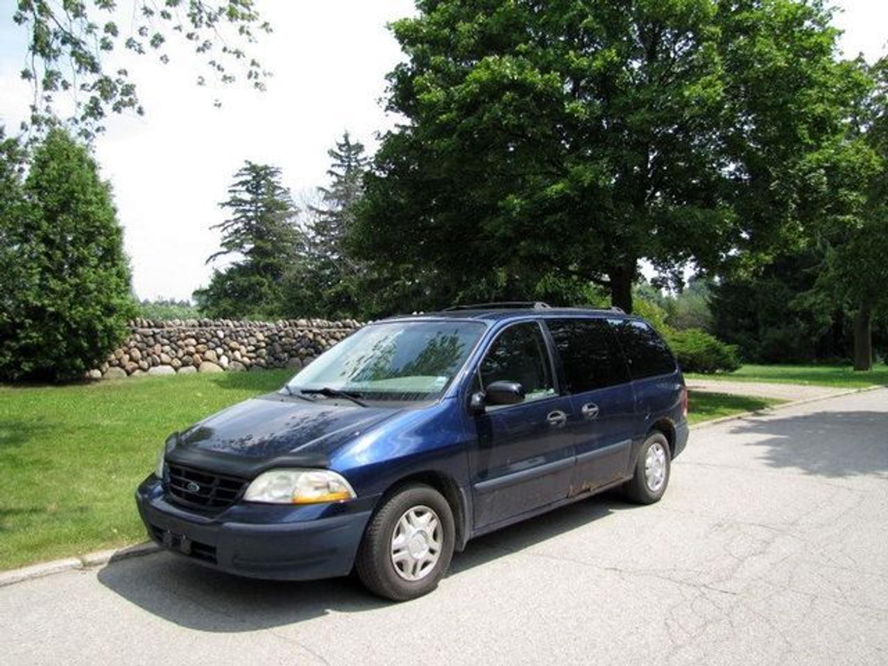 This 2000 Ford Windstar LX RUNS GREAT!! 7 PASSENGER!! AS-IS!! Van features a 3.8L V6 SFI 6 cyl Gasoline engine. It is equipped with a Automatic transmission. The vehicle is Blue with a Grey Cloth interior. Over 400 Better used cars in stock!! PLEASE CALL 1-866-348-8146 A+ Better Business Bureau rating!! Voted Guelphs Favourite dealer 2004-2009!! Since 1961. Taxes, licensing and $5.00 OMVIC fee are extra. WE ARE SELLING THIS ONE "AS IS" and we are required by law to state, even if this vehicle is perfect: &ldquo;Vehicle is not in roadworthy condition, not certified and not e-tested.&rdquo; THIS VEHICLE MAY EVEN HAVE MANUFACTURERS WARRANTY, AND IT MAY BE THE CAR FOR YOU, AT A PRICE YOU CAN AFFORD!!! - This Ford is in Average overall exterior condition, Average overall interior condition, Cloth seats - Air Conditioning, Cruise Control, Power Steering, Power Windows, Power Door Locks, Power Mirrors, Power Drivers Seat, Rear Air Conditioning, Clock, Tilt Steering Wheel, Driver Airbag, Passenger Airbag, Keyless Entry, ABS Brakes, Rear Defogger, AM-FM, Cassette, CD Player, Wheels, Cloth Interior Surface - Contact The Internet Department at 866-738-6045 or leads@markwilsonsbetterusedcarstc.dealer.com for more information. -