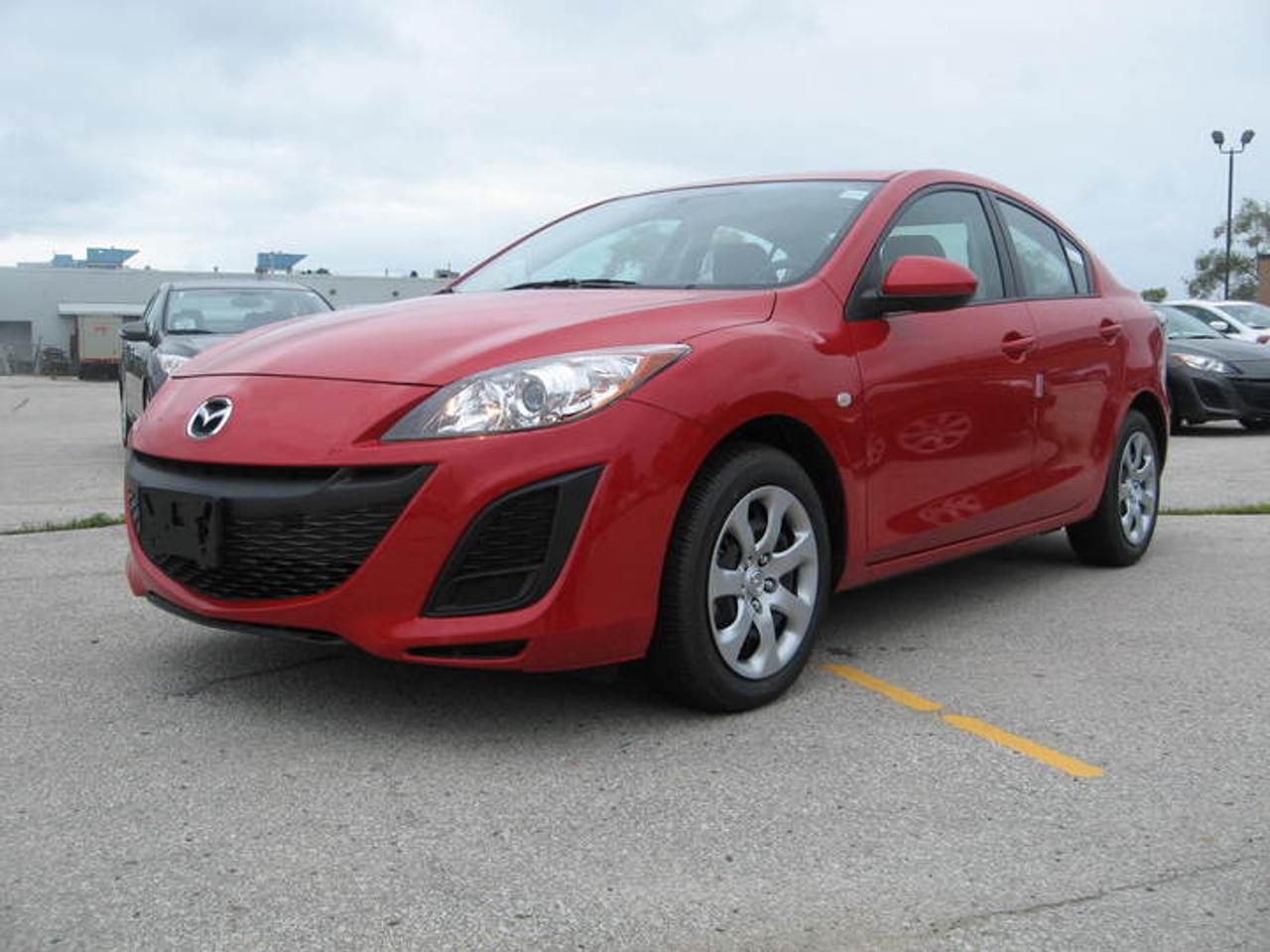 PRE OWNED VEHILCE. NOT A TYPO ONLY 4 KMS!!! PLUS HST ONLY!!! AUTOMATIC AND AIR!!!