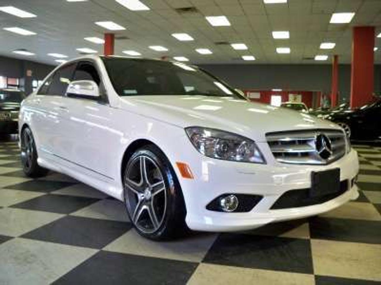 2008 C350 WHITE ON BLACK LEATHER INTARIOR,IT IS EQUIPPED WITH NAVIGATION,PANORAMA ROOF,REAR DUAL SCREEN DVD, HEATED SEATS, SPLIT FOLDING REAR SEATS, SATELLITE RADIO, CD PLAYER, XENON HEADLIGHTS, CORNERING FOG LAMPS, IPOD KIT, HARMAN KARDON STEREO SYSTEM, BLUETOOTH,2 KES,BOOKS,CARPROOF AVAIL, AND LOTS MORE.... .PLEASE CALL OR E-MAIL FOR MORE INFO 1-888-616-7624 www.luxuryandsport.ca