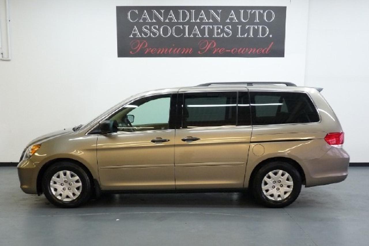 LOCAL ONE OWNER !!!! LX Options include:  ABS, Dual Sliding Doors, Quad Seating, Vehicle Stability Assist w/Traction Control, Dual Front Air Bags Front/2nd/3rd Row Side Curtain Airbags w/Rollover Sensors, Front/Rear Air, CD/MP3, Privacy Glass, , Anti-theft, Keyless Entry, Power Windows/Locks/Mirrors and more. Premium Pre-owned Certified. The balance of manufacturers warranty applies. We offer flexible finance options with top trade allowances. Contact one of our sales professionals regarding this opportunity !!! Visit our website to view 20+ photos & FREE CARFAX with a buy back guarantee.  www.canadianautoassociates.com No Hidden Fees: Advertised Price +HST +Lic.