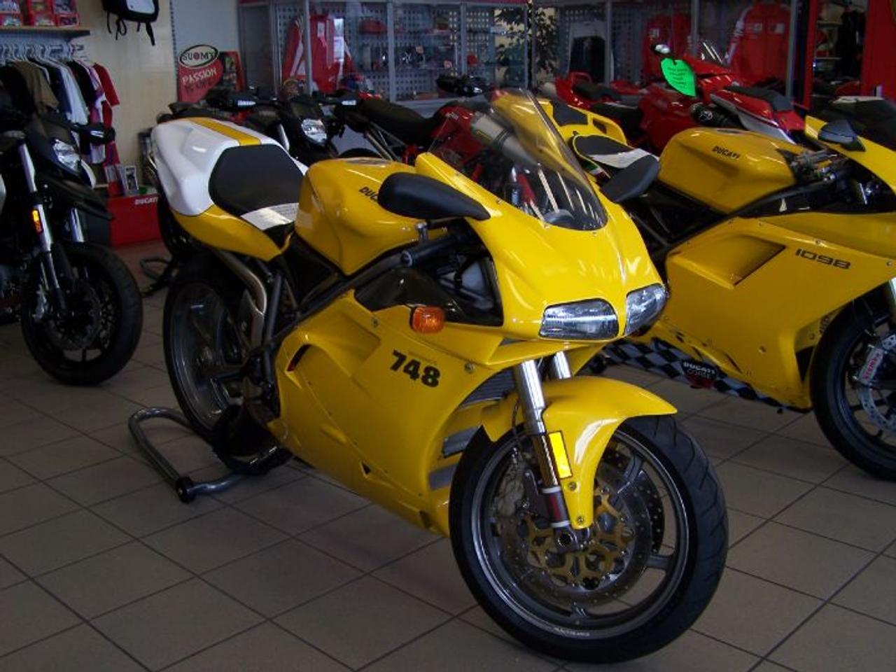 Description: 2001 Ducati 748S 

Only 12,000 Original Kms. Equipped with over $6,000 in performance parts and accessories. Full race exhaust, adjustable brake/clutch leavers, clutch kit, carbon fiber and much more. Please call for more details,Only  $9,995. Fully serviced.  Includes 10,000k Service completed. *** Visit us: Ducati Oakville. Mon./Thurs 9:00am to 8:00pm fri./Sat. 9:00am to 6:00pm. Over 40-50 new and pre-owned Ducati on display. Carrying a full line of Ducati parts, accessories, apparel, gear and performance parts. Little more than 20 minutes from the CN Tower.  QEW west past Trafalgar Square at The Bronte Rd exit turn into Piazza Ducati. Easy Financing available. trades possible , Your GTA West End Ducati Dealer. Best in Ducati Service. Quick turn around. Make it your destination today.   Benvenuti Vi Aspettiamo. 416 410 9465. 1800 999 1209 sales@peninsulaimports.com   call today  www.peninsulaimports.com 
Make it your destination today. Benvenuti Vi Aspettiamo.