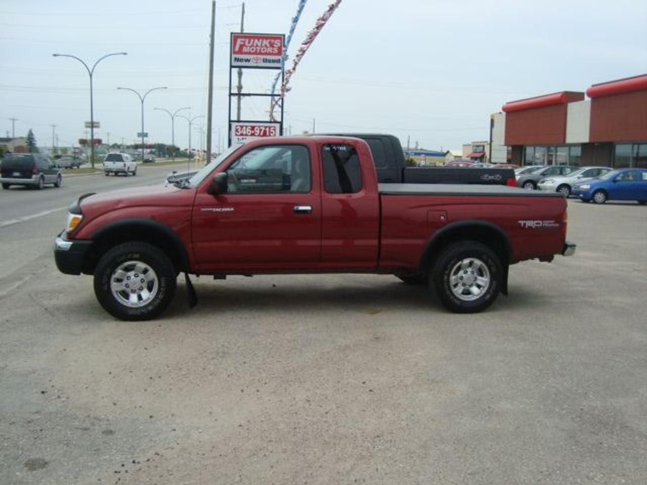 Air Conditioning
Alloy Wheels
AM/FM Stereo
Anti-Lock Brakes
Cassette Player
CD Player
Cruise Control
Driver Side Airbag
Dual Airbag
Intermittent Wipers
Passenger Airbag
Power Brakes
Power Locks
Power Steering
Power Windows
Tilt Steering
Tinted Glass
Tonneau Cover
Tow Package