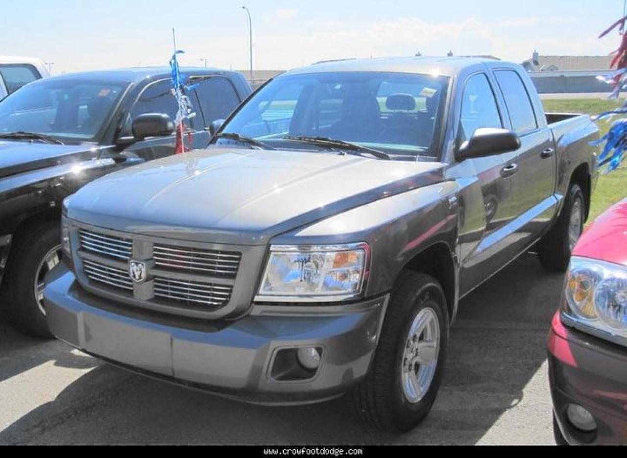 Used 2010 Dodge Dakota Quad Cab 4X4 SXT for sale in Calgary, AB
