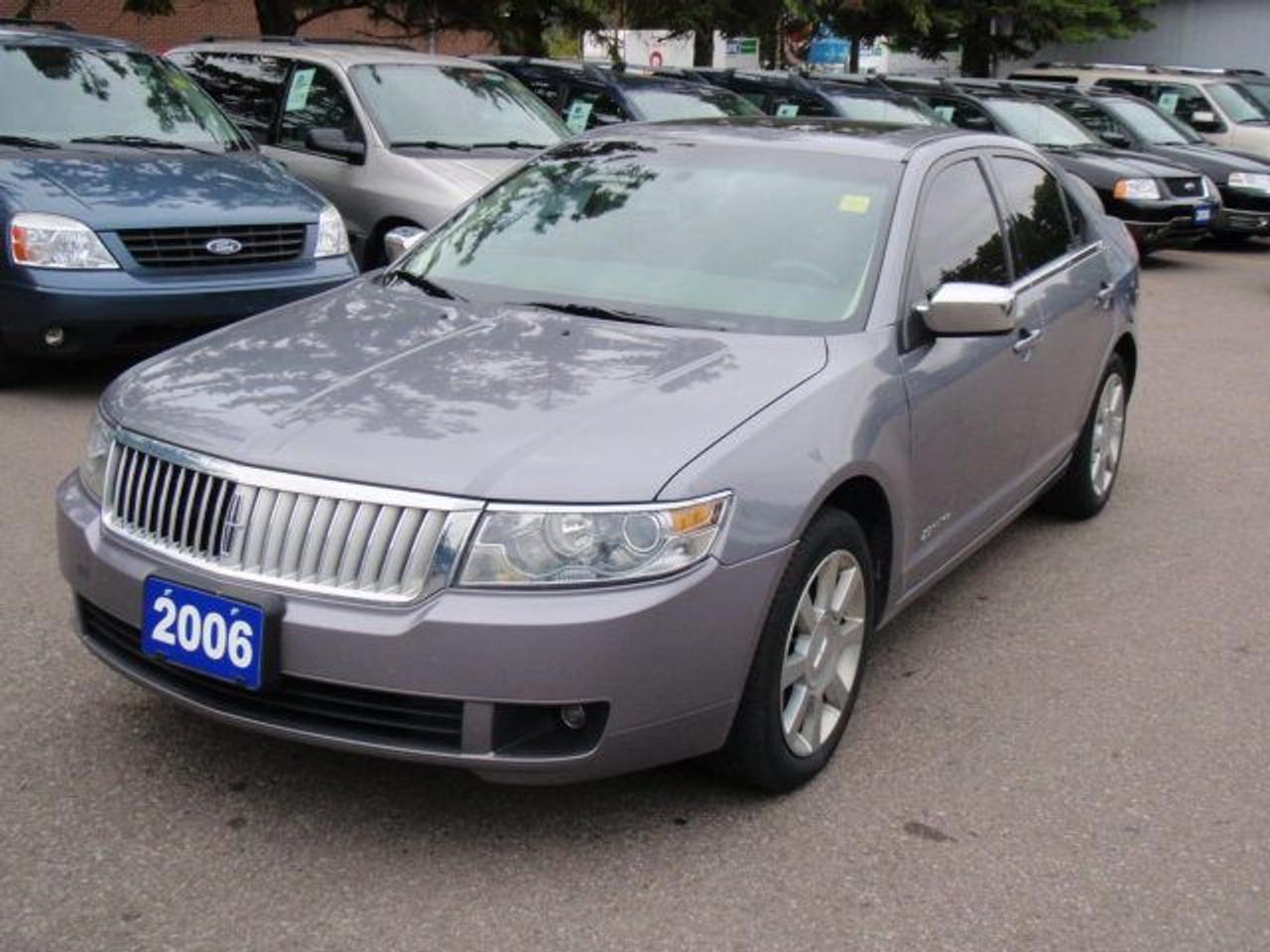 V6, automatic, air conditioning, power group, leather, power roof, wood trim, 17 chrome wheels and much more!  Visit www.erinwoodford.com to view ten pictures of this vehicle and hundreds more!  No hidden fees!  Sale price plus tax only!