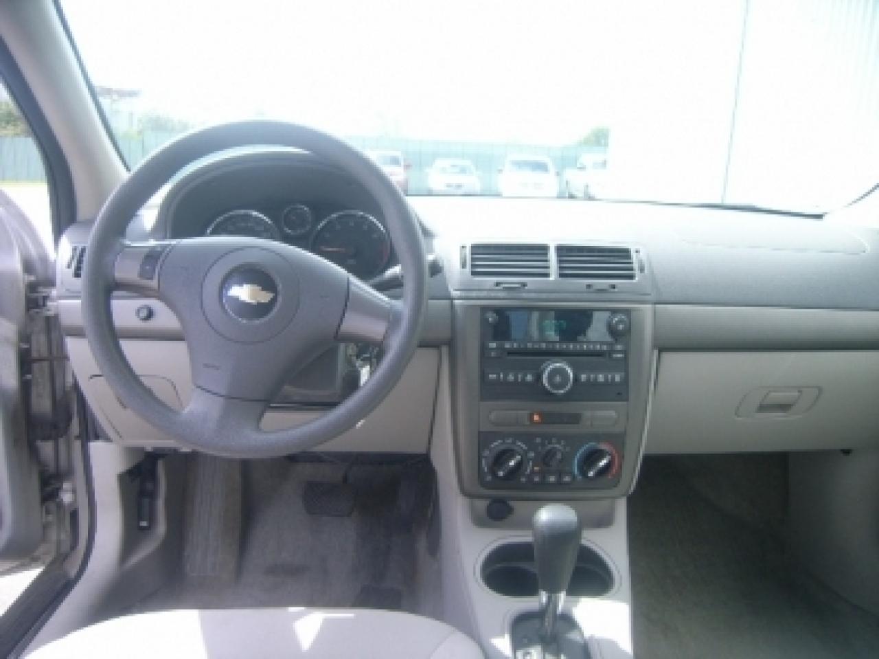 613877