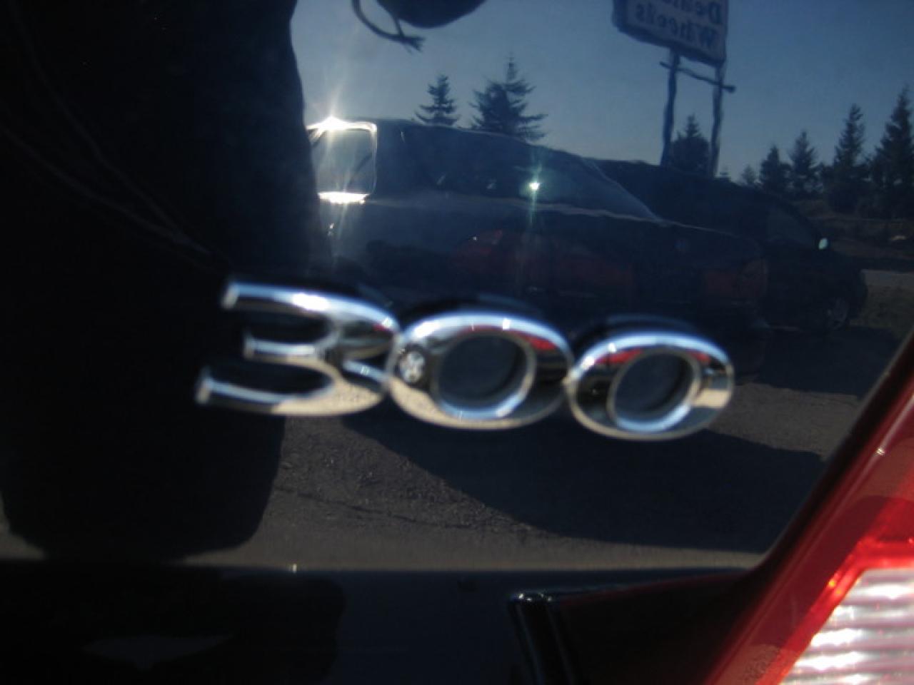614211