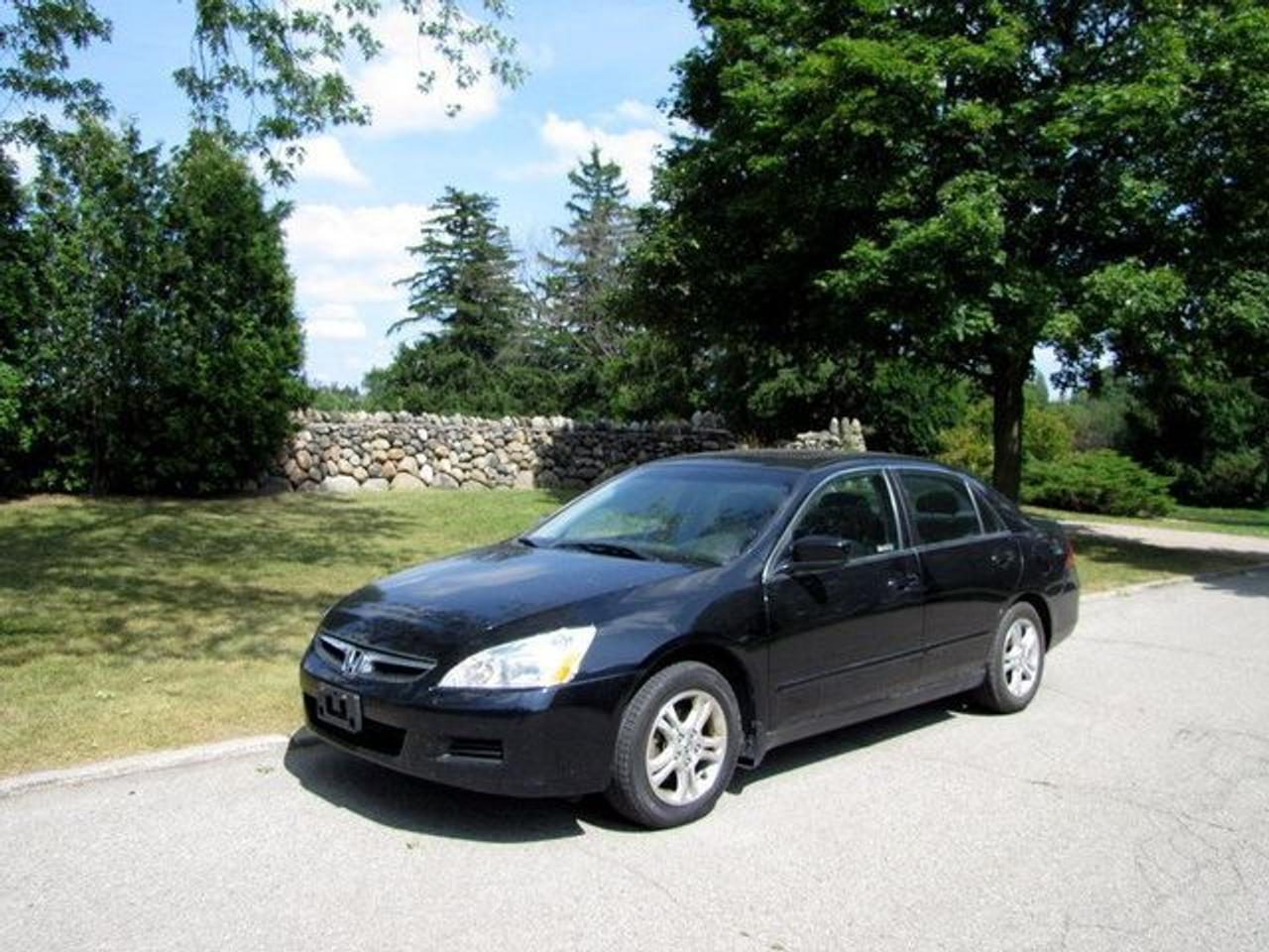 This 2006 Honda Accord 4dr SE SUNROOF!! 4 NEW TIRES!! HONDA LEASE RETN! Sedan features a 2.4L L4 PFI DOHC 16V 4 cyl Gasoline engine. It is equipped with a 5 Speed Manual transmission. The vehicle is Black with a Black Cloth interior. It is offered with the remaining factory warranty. Over 400 BETTER used cars in stock!! PLEASE CALL 1-866-348-8146 5.99% Financing + no payments up to 6 months available on approved credit!! Free Trial Exchange!! A+ Better Business Bureau rating!! Voted Guelphs Favourite dealer 2004-2009!! Since 1961. Taxes, licensing, and $5.00 OMVIC fee are extra. Call for details on our Free Trial Exchange! Thank you for considering Wilsons!!! Please call 1-866-348-8146. - This Honda is in Excellent overall exterior condition, Excellent overall interior condition, Cloth seats - Air Conditioning, Cruise Control, Power Steering, Power Windows, Power Door Locks, Power Mirrors, Clock, Tachometer, Digital Info Center, Tilt Steering Wheel, Telescoping Steering Wheel, Sunroof, Driver Airbag, Passenger Airbag, Keyless Entry, ABS Brakes, Rear Defogger, Intermittent Wipers, AM-FM, CD Player, Alloy Wheels, Cloth Interior Surface - Contact The Internet Department at 866-738-6045 or leads@markwilsonsbetterusedcarstc.dealer.com for more information. -