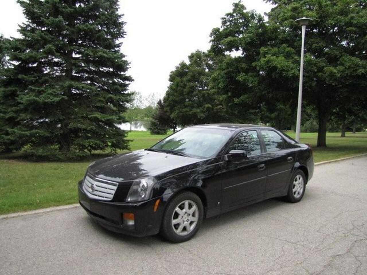 This 2007 Cadillac CTS 4dr LOW KM!! NEW TIRES!! GM LEASE RETURN!! Sedan features a 2.8L V6 SFI DOHC 6cyl Gasoline engine. It is equipped with a Automatic transmission. The vehicle is Black with a Black Leather interior. It is offered with the remaining factory warranty. Over 400 BETTER used cars in stock!! PLEASE CALL 1-866-348-8146 5.99% Financing + no payments up to 6 months available on approved credit!! Free Trial Exchange!! A+ Better Business Bureau rating!! Voted Guelphs Favourite dealer 2004-2009!! Since 1961. Taxes, licensing, and $5.00 OMVIC fee are extra. Call for details on our Free Trial Exchange! Thank you for considering Wilsons!!! Please call 1-866-348-8146. - This Cadillac is in Excellent overall exterior condition, Excellent overall interior condition, Leather seats - Air Conditioning, Climate Control, Dual Zone Climate Control, Cruise Control, Power Steering, Power Windows, Power Door Locks, Power Mirrors, Leather Steering Wheel, Power Drivers Seat, Heated Seat, Clock, Tachometer, Digital Info Center, Tilt Steering Wheel, Steering Wheel Radio Controls, Driver Airbag, Passenger Airbag, Keyless Entry, ABS Brakes, Traction Control, Rear Defogger, Intermittent Wipers, AM-FM, CD Player, Alloy Wheels, Leather Interior Surface - Contact The Internet Department at 866-738-6045 or leads@markwilsonsbetterusedcarstc.dealer.com for more information. -