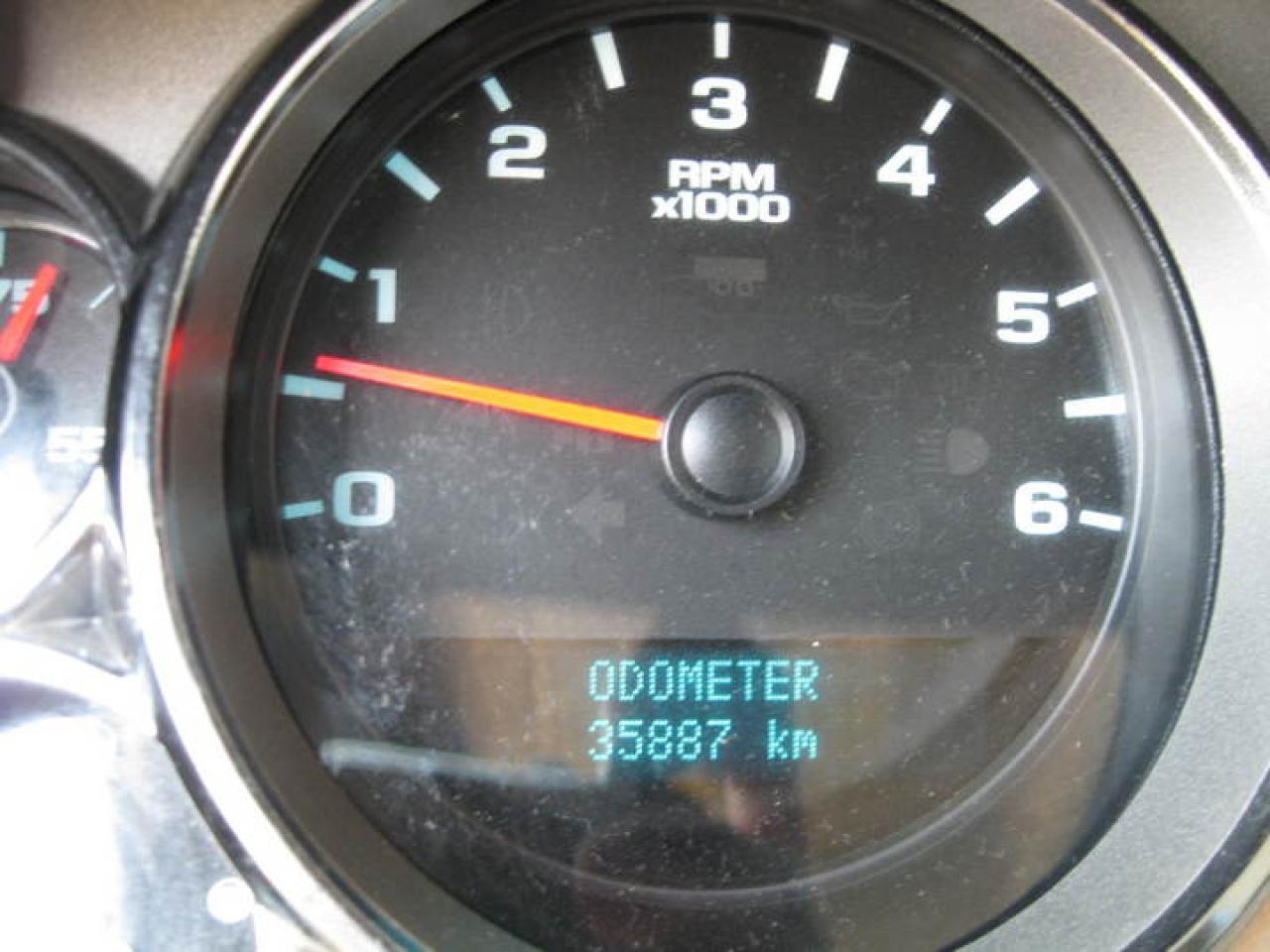 614411