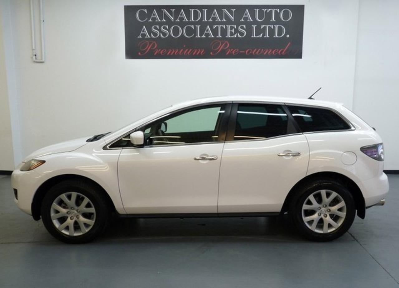 ONE OWNER !!! Amenities include: Navigation, Reverse Camera, Moonroof, * 4 New Tires* Leather, Heated Seats, Power Driver Seat, Rear Privacy Glass, 6 Disc CD/MP3 w/ Premium Bose Audio System, 18 Alloys, Bixenons, Traction Control, Dynamic Stability Control, Halogen Headlights, Anti-theft, Keyless Entry, Power Windows/Locks/Mirrors and more. Premium Pre-Owned Certified. The balance of Manufacturers warranty applies. We offer flexible finance options with top trade allowances. Contact one of our sales professionals regarding this opportunity !!! Visit our website to view 20+ photos & FREE CARFAX with a buy back guarantee. www.canadianautoassociates.com No Hidden Fees: Advertised Price +HST +Lic.