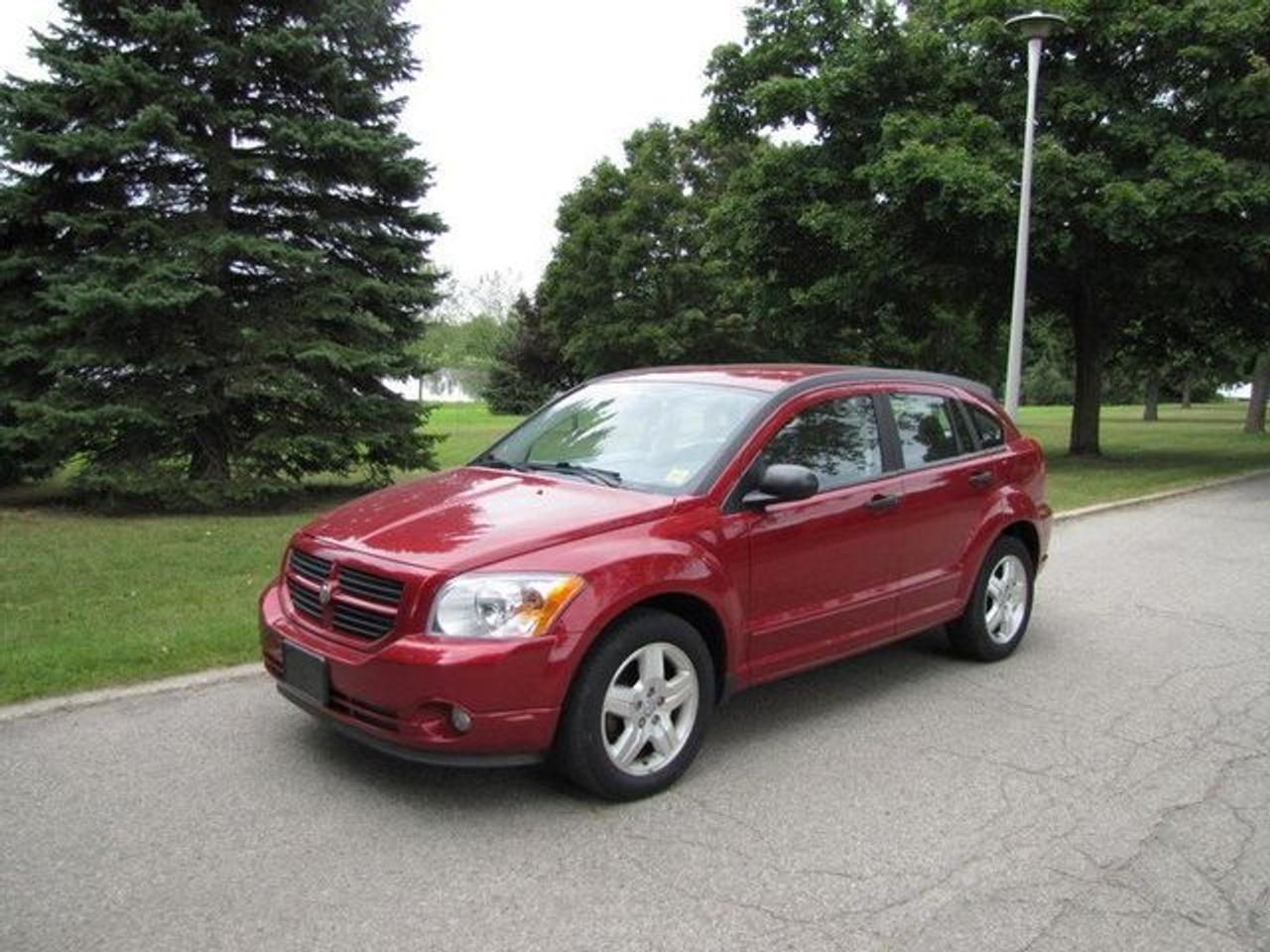 This 2007 Dodge Caliber 4dr SXT PREMIUM PACKAGE NEW TIRES!! ALLOYS!! Sedan features a 2.0L L4 DOHC 16V 4cyl Gasoline engine. It is equipped with a Automatic transmission. The vehicle is INFERNO RED with a PASTEL SLATE GRAY Cloth interior. It is offered with the remaining factory warranty. Over 400 BETTER used cars in stock!! PLEASE CALL 1-866-348-8146 5.99% Financing + no payments up to 6 months available on approved credit!! Free Trial Exchange!! A+ Better Business Bureau rating!! Voted Guelphs Favourite dealer 2004-2009!! Since 1961. Taxes, licensing, and $5.00 OMVIC fee are extra. Call for details on our Free Trial Exchange! Thank you for considering Wilsons!!! Please call 1-866-348-8146. - This Dodge is in Excellent overall exterior condition, Excellent overall interior condition, Cloth seats - Air Conditioning, Cruise Control, Power Steering, Power Windows, Power Door Locks, Power Mirrors, Clock, Tachometer, Tilt Steering Wheel, Driver Airbag, Passenger Airbag, Keyless Entry, ABS Brakes, Rear Defogger, Fog Lights, Intermittent Wipers, AM-FM, CD Player, Alloy Wheels, Cloth Interior Surface, Aux. Audio Input - Contact The Internet Department at 866-738-6045 or leads@markwilsonsbetterusedcarstc.dealer.com for more information. -