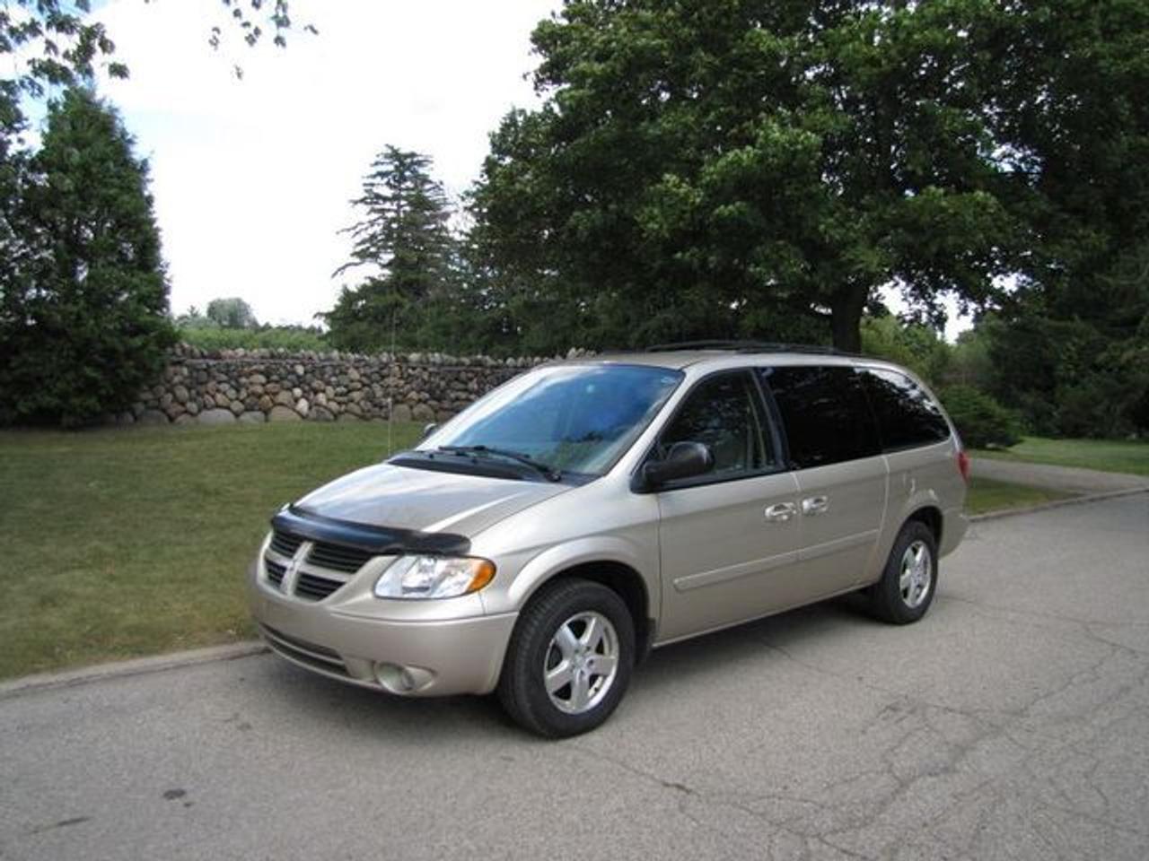 This 2006 Dodge Grand Caravan SXT BIG 3.8V6!! TV-DVD!! CHRYSLER LEASE RETURN!! Van features a 3.8L V6 SFI 6 cyl Gasoline engine. It is equipped with a Automatic transmission. The vehicle is Linen Gold Metallic Clearcoat with a Dark Khaki-Light Graystone Cloth interior. Over 400 BETTER used cars in stock!! PLEASE CALL 1-866-348-8146 5.74% Financing + no payments up to 6 months available on approved credit!! Free Trial Exchange!! A+ Better Business Bureau rating!! Voted Guelphs Favourite dealer 2004-2009!! Since 1961. Taxes, licensing, and $5.00 OMVIC fee are extra. Call for details on our Free Trial Exchange! Thank you for considering Wilsons!!! Please call 1-866-348-8146. - This Dodge is in Excellent overall exterior condition, Excellent overall interior condition, Cloth seats - Air Conditioning, Dual Zone Climate Control, Cruise Control, Tinted Windows, Power Steering, Power Windows, Power Door Locks, Power Mirrors, Leather Steering Wheel, Roof Rack, Rear Air Conditioning, Clock, Tachometer, Tilt Steering Wheel, Driver Airbag, Passenger Airbag, Keyless Entry, ABS Brakes, Traction Control, Rear Defogger, Intermittent Wipers, AM-FM, CD Player, 16 inch Wheels, Cloth Interior Surface, POWER SIDE DOORS Power Sliding Door, Power Lift Gate - Contact The Internet Department at 866-738-6045 or leads@markwilsonsbetterusedcarstc.dealer.com for more information. -
