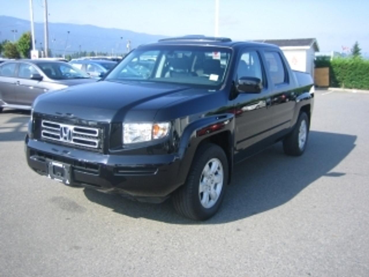 Speak with a product specialis now: 1-800-657-8681

Here is a great luxury crewcab truck that is in great condition....has many extras such as steering wheel audio control, sunroof, automatic climate control. Plus it has a two way tail gate and a secret trunk space. This vehicle is well worth taking for a test drive today.

Do you have Good Credit, No Credit, Bad Credit or Bankruptcy? At Harris Mitsubishi we will get you approved today!