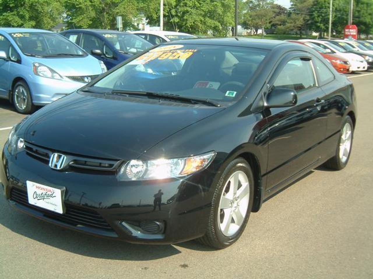 THIS CAR IS VERY CLEAN, LOW KMS, ALL  THE POWER OPTIONS.  LOOKS VERY  SHARP IN BLACK.  ALL SERVICE IS UP TO  DATE, THIS CAR IS READY TO GO.   VEHICLE PRICE WAS $18950 HONDA CIVIC CLEARANCE SALE: $16950  SAVE $2000.00!!!!  WARRANTY INFORMATION:  THIS VEHICLE HAS HONDA FACTORY  WARRANTY REMAINING UNTIL MARCH OF  2013, OR 100K.  HONDA CERTIFIED WARRANTY AVAILABLE  WHICH ADDS AN ADDITIONAL YEAR/ 20K TO  THE FACTORY WARRANTY.  FINANCING AVAILABLE FROM 2.9%  WWW.CENTENNIALHONDA.COM  Come visit us at Centennial Honda, located at  610 South Drive in Summerside.  We are only  45 Minutes from Charlottetown! Call us toll-free at 1 877 339-6030