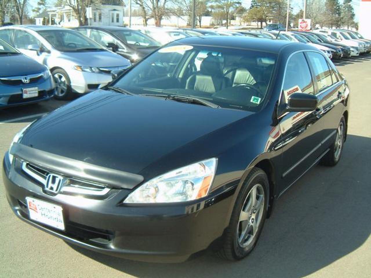 2005 HONDA ACCORD HYBRID  THIS CAR IS FULLY LOADED WITH ALL THE  POWER OPTIONS, INCLUDING POWER  WINDOWS, LOCKS AND MIRRORS, AND  CRUISE CONTROL.  IT ALSO HAS LEATHER  INTERIOR, AND 16 ALLOY WHEELS.  THIS  IS A LUXURY CAR THAT IS VERY ECONOMIC.  PRICE WAS: $13950.00 NOW ONLY: $12950.00  WWW.CENTENNIALHONDA.COM   Come visit us at Centennial Honda, located at  610 South Drive in Summerside.  We are only  45 Minutes from Charlottetown! Call us toll-free at 1 877 339-6030