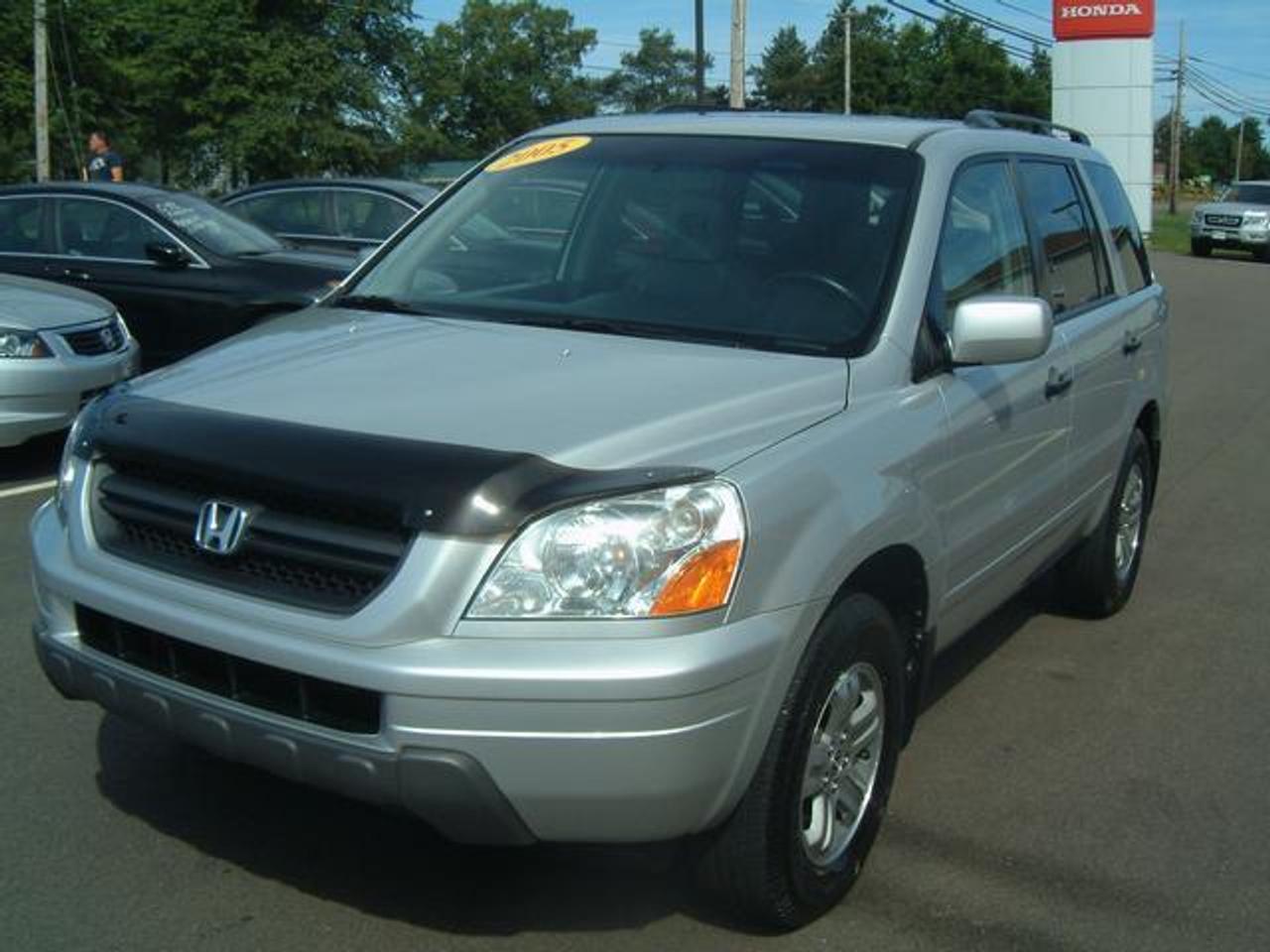 2005 HONDA PILOT EX-L  THIS VEHICLE IS A GREAT SUV.  FULLY  LOADED WITH EVERYTHING FROM POWER  WINDOWS TO LEATHER INTERIOR.  IT ALSO  HAS EXTRAS SUCH AS A HOOD EDGE  DEFLECTOR AND A TOW PACKAGE.  ALL  SERVICE HAS BEEN BROUGHT UP TO DATE  ON THIS VEHICLE INCLUDING THE TIMING  BELT.  WARRANTY INFORMATION: FACTORY WARRANTY REMAINING UNTIL  2010 OR 100K. HONDA CERTIFIED WARRANTY AVAILABLE  WHICH EXTENDS THE WARRANTY UNTIL  2011 OR 120K.  FINANCING AVAILABLE FROM 5.9%  Come visit us at Centennial Honda, located at  610 South Drive in Summerside.  We are only  45 Minutes from Charlottetown! Call us toll-free at 1 877 339-6030