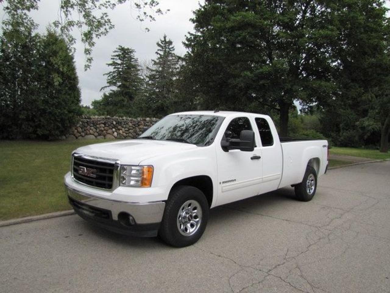 This 2007 GMC Sierra 1500 SLE LONG BOX !! NEW TIRES!! GM LEASE RETURN! 4x4 Truck features a 5.3L V8 SFI 8 cyl Gasoline engine. It is equipped with a Automatic transmission. The vehicle is White with a Black Cloth interior. It is offered with the remaining factory warranty. Over 400 BETTER used cars in stock!! PLEASE CALL 1-866-348-8146 5.99% Financing + no payments up to 6 months available on approved credit!! Free Trial Exchange!! A+ Better Business Bureau rating!! Voted Guelphs Favourite dealer 2004-2009!! Since 1961. Taxes, licensing, and $5.00 OMVIC fee are extra. Call for details on our Free Trial Exchange! Thank you for considering Wilsons!!! Please call 1-866-348-8146. - This GMC is in Excellent overall exterior condition, Excellent overall interior condition, Cloth seats - Air Conditioning, Cruise Control, Power Steering, Power Windows, Power Door Locks, Power Mirrors, Leather Steering Wheel, Tow Package, Clock, Tachometer, Digital Info Center, Tilt Steering Wheel, Driver Airbag, Passenger Airbag, Keyless Entry, ABS Brakes, Traction Control, Intermittent Wipers, AM-FM, CD Player, 17 inch Wheels, Cloth Interior Surface, Four Wheel Drive - Contact The Internet Department at 866-738-6045 or leads@markwilsonsbetterusedcarstc.dealer.com for more information. -