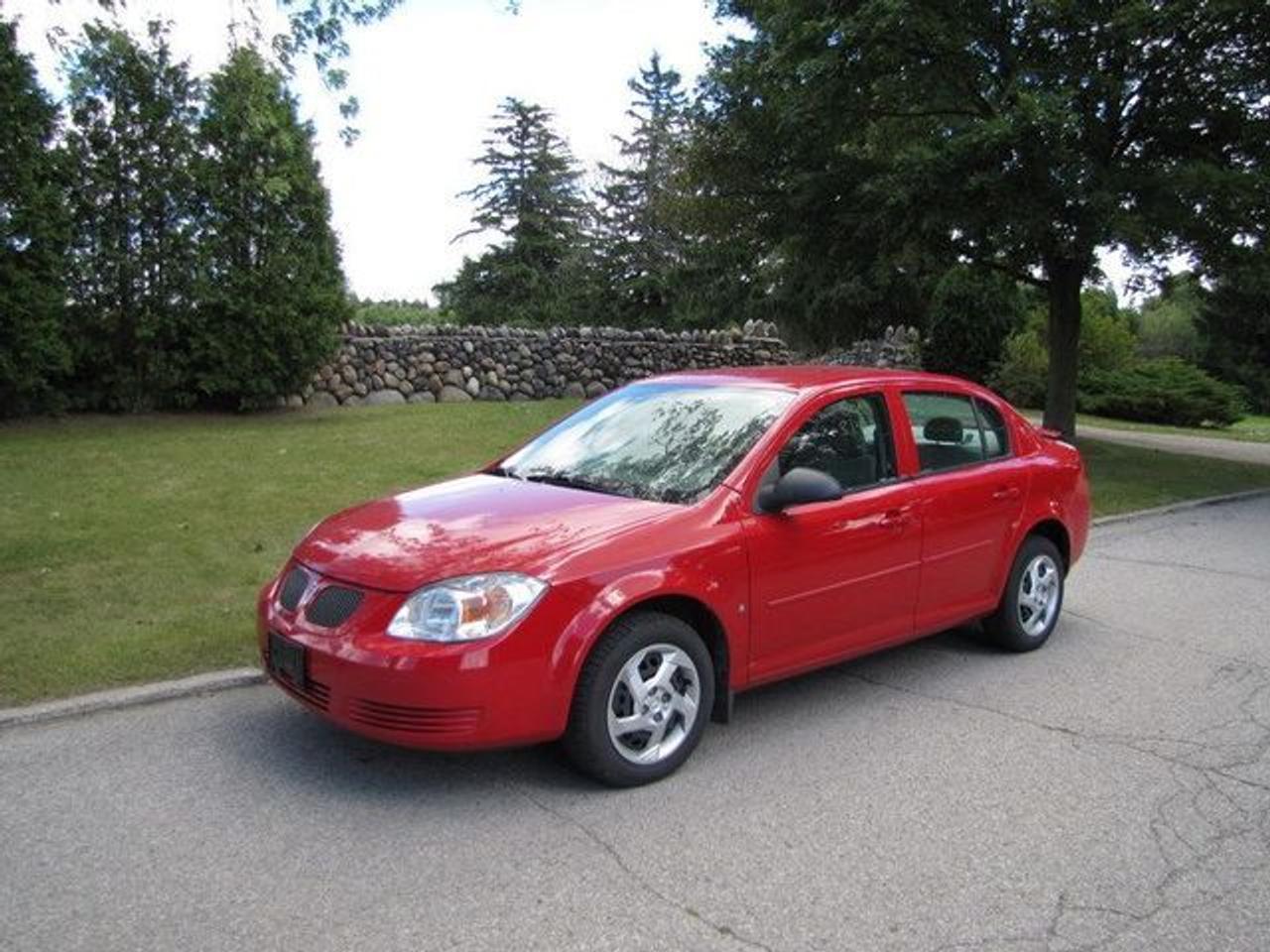 This 2006 Pontiac Pursuit 4dr SPOILER!! GM LEASE RETURN!! Sedan features a 2.2L L4 SFI 4 cyl Gasoline engine. It is equipped with a 5 Speed Manual transmission. The vehicle is Red with a Grey Cloth interior. Over 400 Better used cars in stock!! 5.99% Financing + no payments up to 6 months available on approved credit. This Vehicle is not pre-inspected, you have the opportunity to buy it as is, it may need little or nothing for safety. You are encouraged to have it inspected by a mechanic prior to purchasing. We think it is in good condition. We are required by law to declare the following on as is sales: "The motor vehicle in this advertisement is being offered "as is" and is not represented as being in a road worthy condition, mechanically sound or maintained at any guaranteed level of quality. The vehicle may not be fit for use as a means of transportation and may require substantial repairs at the purchasers expense. It may not be possible to register the vehicle to be driven in its current condition. It must be said that the vehicle is not drivable(even if it is) , not certified, and not e-tested." Taxes, licensing and $5.00 OMVIC fee extra. If you need to save some money, this may be the car for you!!! - This Pontiac is in Excellent overall exterior condition, Excellent overall interior condition, Cloth seats - Air Conditioning, Cruise Control, Power Steering, Power Door Locks, Clock, Tachometer, Digital Info Center, Tilt Steering Wheel, Driver Airbag, Passenger Airbag, Keyless Entry, ABS Brakes, Rear Defogger, Intermittent Wipers, AM-FM, CD Player, Wheels, Cloth Interior Surface, Rear Spoiler, Rear Spoiler - Contact The Internet Department at 866-738-6045 or leads@markwilsonsbetterusedcarstc.dealer.com for more information. -