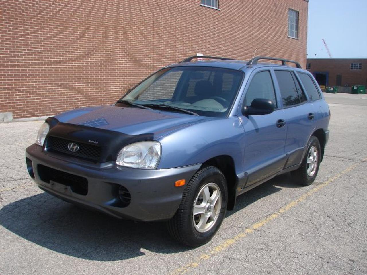 2003 Hyundai Santa Fe V6 2.7L, Auto, FWD. Excellent Contidion. Car-Proof Clean. Drives like new. A/C, Pwr. Win, locks. Very clean & reliable SUV. Certified & E-tested. Call (905)271-9127. email: e-zeewheels@rogers.com. www.e-zeewheels.com