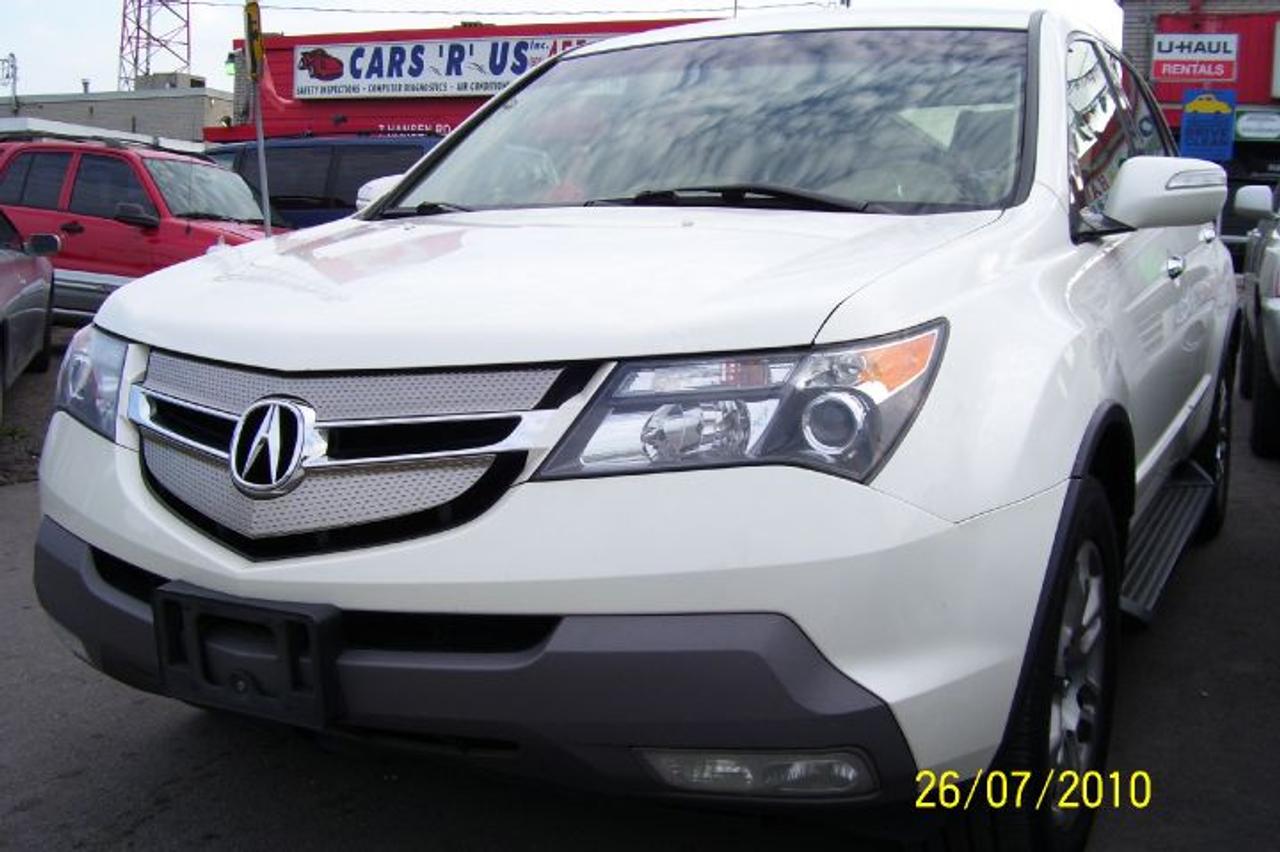 YEAR 07 MDX WITH TECH PACKAGE,DVD,BACK-UP CAMERA,DUAL EXHAUST,LEATHER,SUN-ROOF,RUNNING BOARDS,ALLOY WHEELS,BEAUTIFUL PEARL WHITE EXT,2 YEARS WARRANTY WITH SAFETY & EMMISON. HST NOT IN THE PRICE.