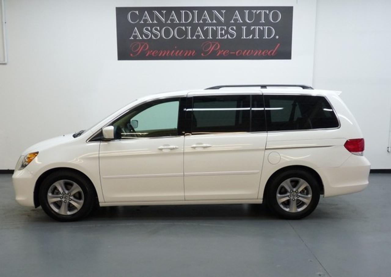 TOP OF THE LINE ONE OWNER!!! Amenities include: Navigation, Rear DVD Entertainment, Reverse Camera, Moonroof, Leather, Heated Seats, Memory Seat, Power Adjustable Pedals, Dual Power Sliding Doors, 6 Disc CD/MP3, HomeLink,  Dual Zone Climate Control, 7 Passenger Seating, Privacy Glass, Anti-theft, Keyless Entry, Power Windows/Locks/Mirrors and more. Premium Pre-Owned Certified.  We offer flexible finance options with top trade allowances. Contact one of our sales professionals regarding this opportunity !!! Visit our website to view 20+ photos & FREE CARFAX with a buy back guarantee.  www.canadianautoassociates.com  No Hidden Fees: Advertised Price +HST +Lic.