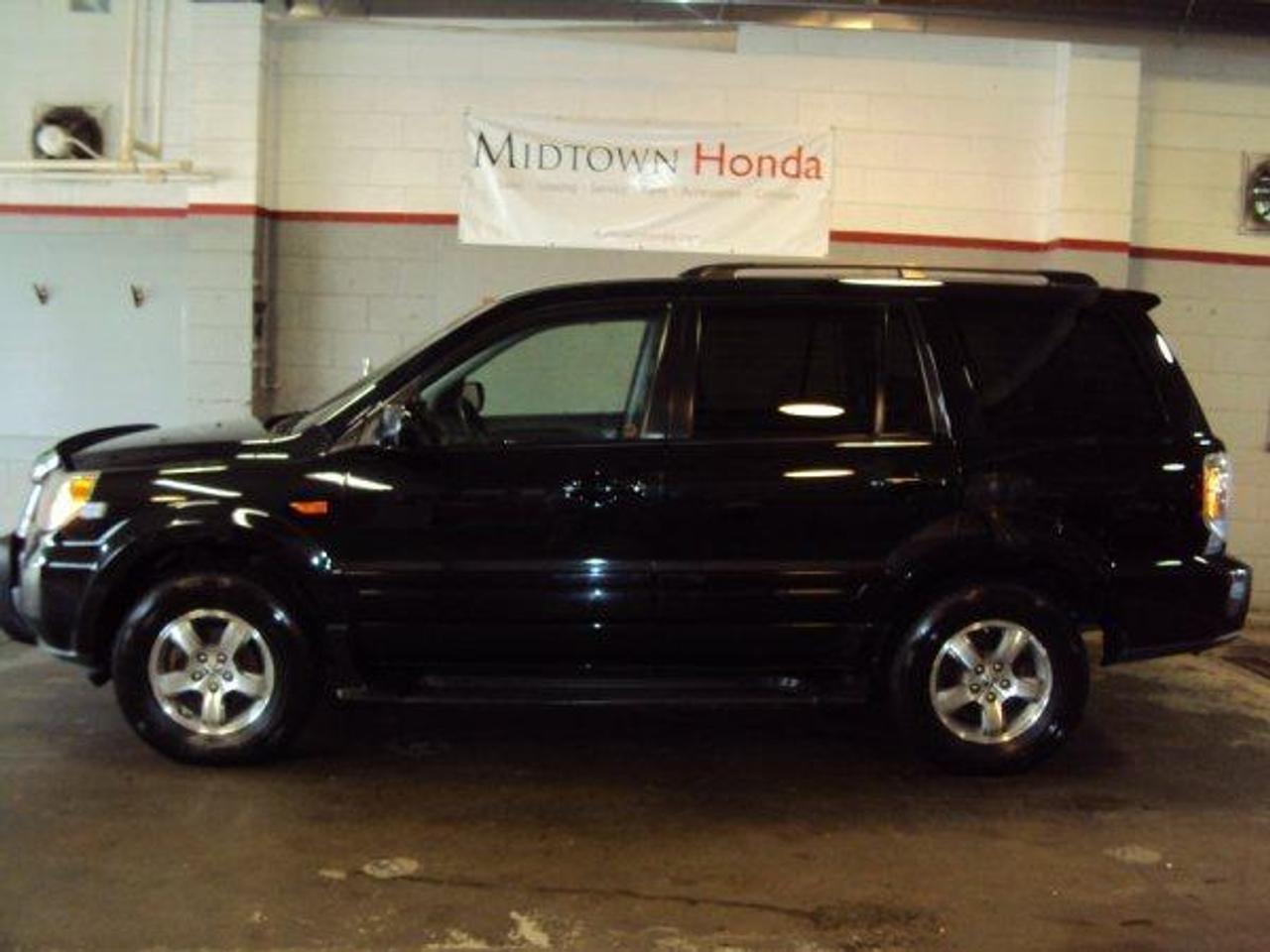 ONE OWNER...TRADE IN.... GREAT SERVICE  RECORDS... CARPOOF... MOSTLY HIGHWAY  KMS.... SAFETY AND EMISSIONS  INCLUDED... 30 DAY FULL COVERAGE  WARRANTY INCLUDED... BRAND NEW  TIRES AND COMES WITH WINTER TIRES AS  WELL....NAVIGATION, LEATHER, SUNROOF  AND MUCH MORE... CALL OR COME IN  NOW.. MIDTOWN HONDA, QUALITY CARS  FAIR PRICES Call us toll-free at 1 877 240-2142
