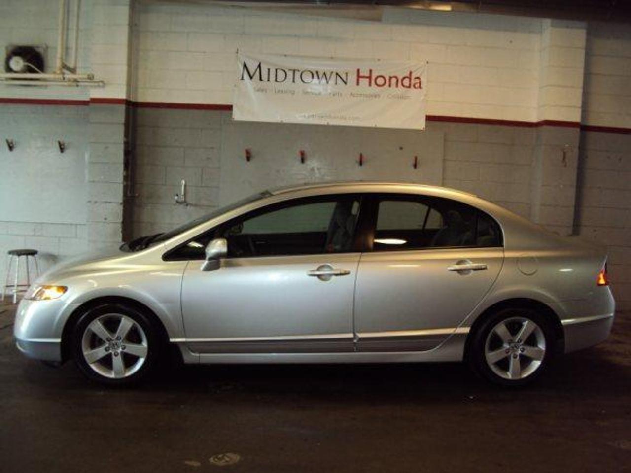 ONE OWNER... NO ACCIDENTS... HONDA  CERTIFIED.... 100 POINT INSPECTION... 6YR  PT WARRANTY.... 4 DR, SUNROOF, ALLOYS  AND MUCH MORE.... CALL OR COME IN  NOW... MIDTOWN HONDA, QUALITY CARS  FAIR PRICES Call us toll-free at 1 877 240-2142