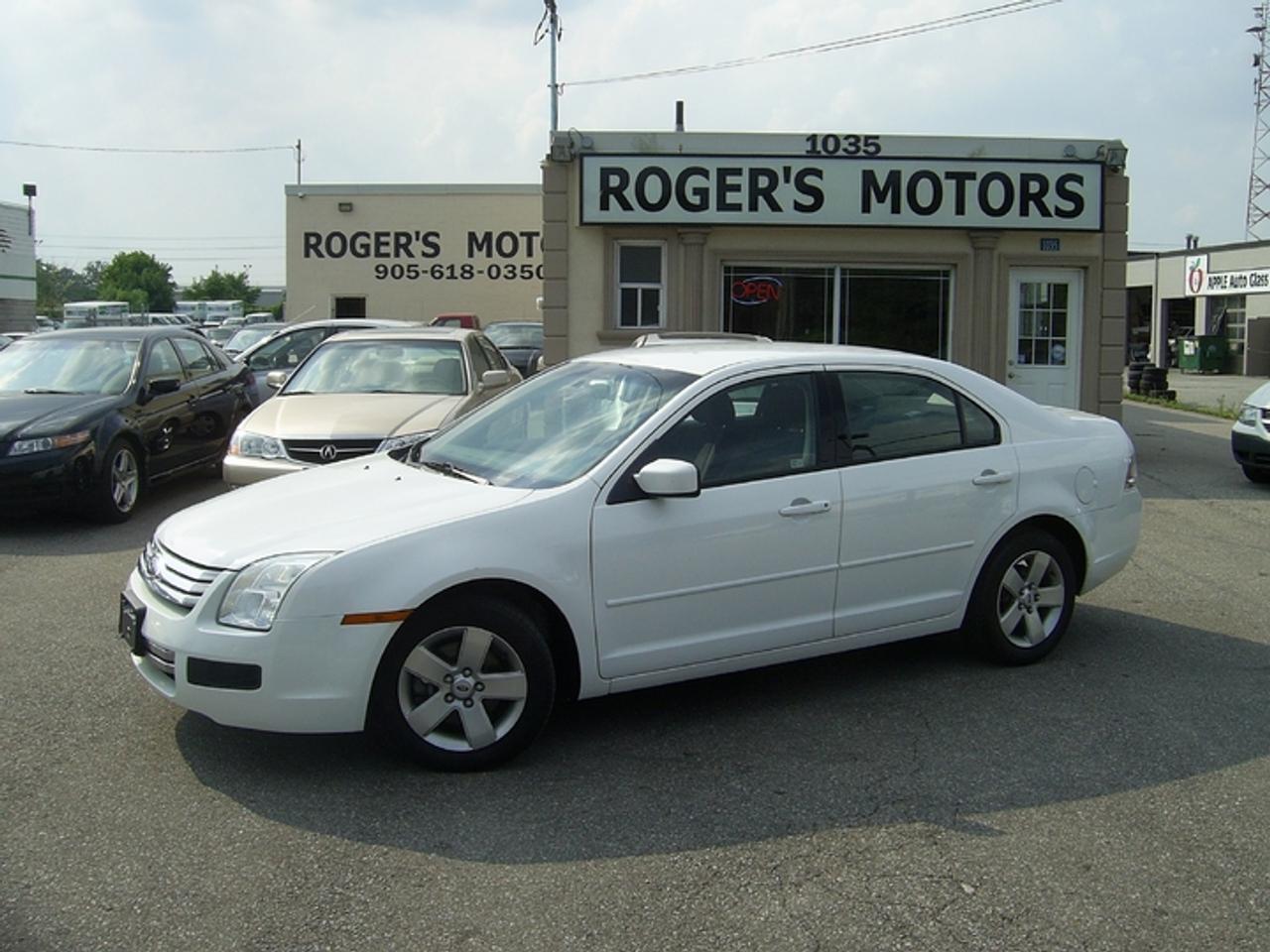 *NO ACCIDENTS* *NO HIDDEN FEES! NO ADMIN, NO PDI! JUST THE PRICE + TAX, CERTIFIED & E-TESTED NO CHARGE! FREE HISTORY REPORT WITH EVERY VEHICLE! OVER 10 YEARS IN BUSINESS** FAMILY OWNED & OPERATED! 

2006 Ford Fusion SE. Loaded with Automatic Transmission, 49,100kms, All the Power Options Including Alloy Rims, Power Seat, MP3 Stereo! One Owner Off Lease! The Body, Interior and Drive are Excellent! 

Serving the Oakville, Mississauga, Milton, Burlinton, Hamilton, and Greater Toronto Area. 

Financing Available Starting at 5.99 % O.A.C. Call Today to Schedule Your Appointment! 

Thank You For Considering Rogers Motors! 
This vehicle is located at

Rogers Motors Ontario
1035 Speers Rd 
Oakville, ON L6L 2X5 

Please Call 
Local - 905-618-0350
1 (888) 750-5952