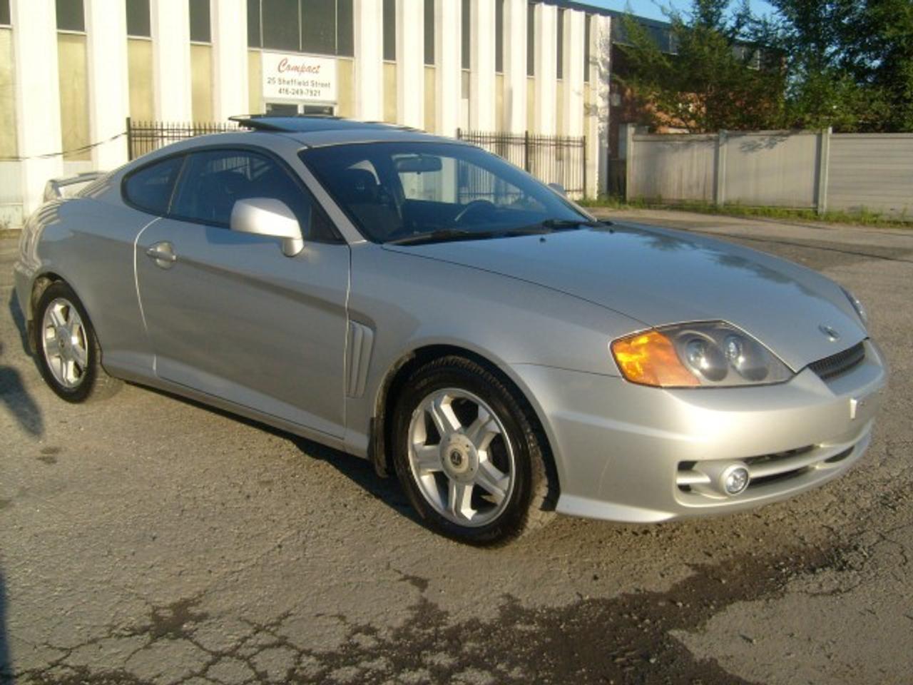 Auto, Sunroof, Runs and looks Great!!!(safety, e-test and 2 years warranty is additional $499.00) .