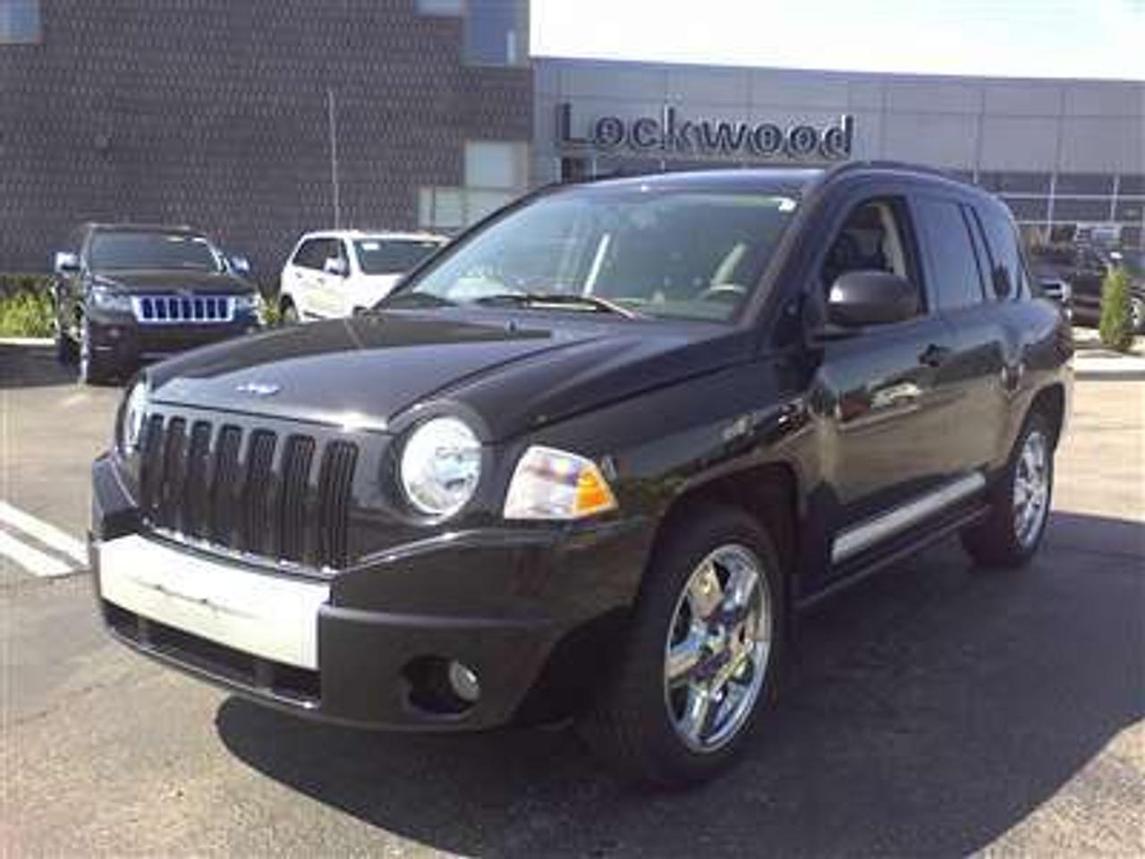 LOW LOW LOW MILEAGE!!! COME TODAY AND SEE THIS NEW ARRIVAL. JUST TRADED IN. 2008 JEEP COMPASS WITH LOTS OF TOYS! FROM THE CHROME WHEELS, LEATHER AND HEATED SEATS, SUNROOF, THIS VEHICLE HAS ALL THE LOOKS INSIDE AND OUT. CALL US TODAY TO BOOK AN APPOINTMENT. THIS WONT LAST LONG. CAR PROOF VERIFIED, PRICE IS PLUS HST.