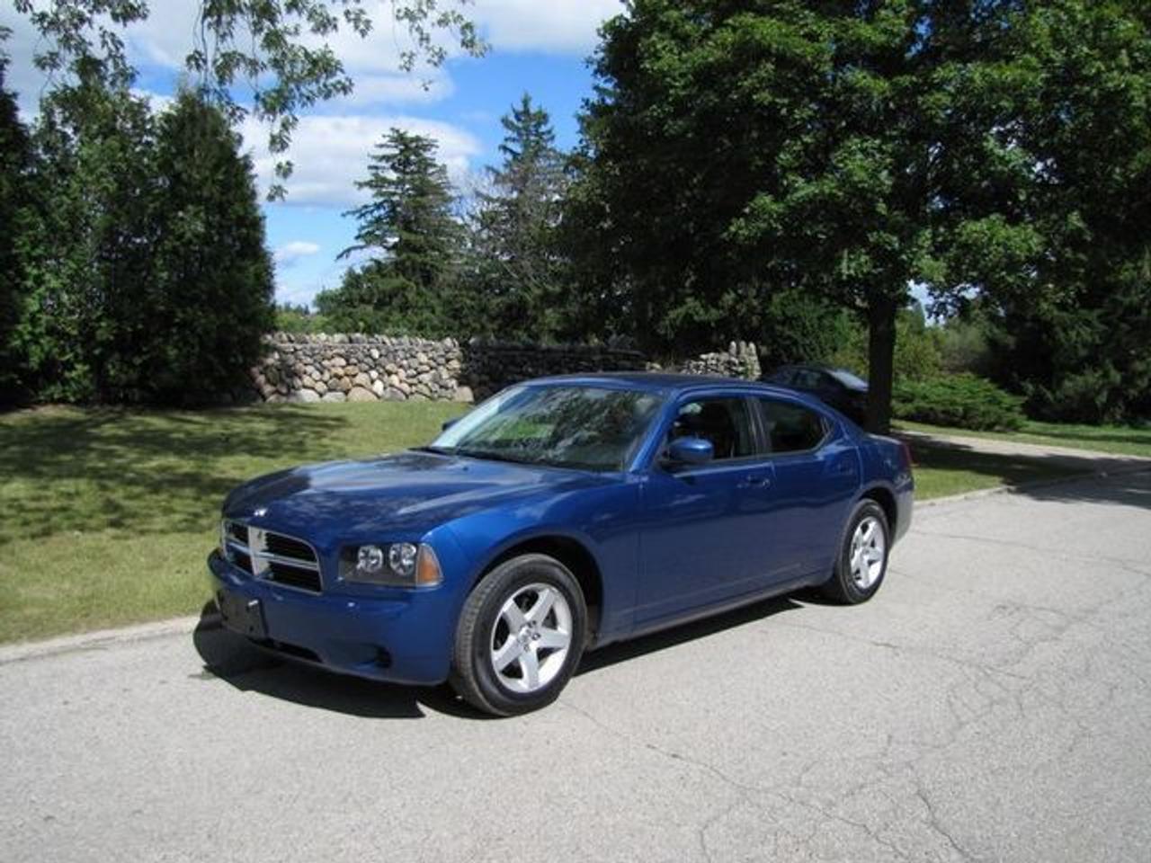 This 2010 Dodge Charger 4dr 17 INCH ALLOYS!! LOADED!! Sedan features a 2.7L V6 MPI DOHC 24V 6 cyl Gasoline engine. It is equipped with a Automatic transmission. The vehicle is Blue with a Black Cloth interior. It is offered with the remaining factory warranty. Over 400 BETTER used cars in stock!! PLEASE CALL 1-866-348-8146 5.99% Financing + no payments up to 6 months available on approved credit!! Free Trial Exchange!! A+ Better Business Bureau rating!! Voted Guelphs Favourite dealer 2004-2009!! Since 1961. Taxes, licensing and $5.00 OMVIC fee are extra. Former daily rental. Call for details on our Free Trial Exchange! Thank you for considering Wilsons!!! Please call 1-866-348-8146 - This Dodge is in Excellent overall exterior condition, Excellent overall interior condition, Cloth seats - Air Conditioning, Cruise Control, Power Steering, Power Windows, Power Door Locks, Power Mirrors, Clock, Tachometer, Digital Info Center, Tilt Steering Wheel, Telescoping Steering Wheel, Driver Airbag, Passenger Airbag, Keyless Entry, ABS Brakes, Traction Control, Rear Defogger, Intermittent Wipers, AM-FM, CD Player, Alloy Wheels, Cloth Interior Surface - Contact The Internet Department at 866-738-6045 or leads@markwilsonsbetterusedcarstc.dealer.com for more information. -
