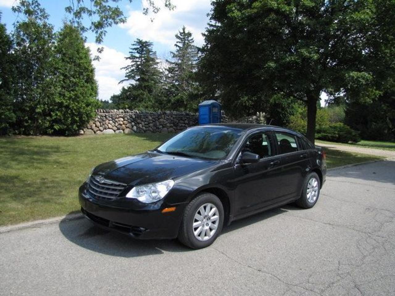 This 2010 Chrysler Sebring 4dr LX LOADED!! Sedan features a 2.4L L4 SFI DOHC 16V 4cyl Gasoline engine. It is equipped with a 4 Speed Automatic transmission. The vehicle is Black with a Grey Cloth interior. It is offered with the remaining factory warranty. Over 400 BETTER used cars in stock!! PLEASE CALL 1-866-348-8146 5.99% Financing + no payments up to 6 months available on approved credit!! Free Trial Exchange!! A+ Better Business Bureau rating!! Voted Guelphs Favourite dealer 2004-2009!! Since 1961. Taxes, licensing and $5.00 OMVIC fee are extra. Better pictures at www.shopwilsons.com Former daily rental. Call for details on our Free Trial Exchange! Thank you for considering Wilsons!!! Please call 1-866-348-8146. - This Chrysler is in Excellent overall exterior condition, Excellent overall interior condition, Cloth seats - Air Conditioning, Cruise Control, Power Steering, Power Windows, Power Door Locks, Power Mirrors, Clock, Tachometer, Digital Info Center, Tilt Steering Wheel, Driver Airbag, Passenger Airbag, Keyless Entry, ABS Brakes, Rear Defogger, Intermittent Wipers, AM-FM, CD Player, Wheels, Cloth Interior Surface, Aux. Audio Input - Contact The Internet Department at 866-738-6045 or leads@markwilsonsbetterusedcarstc.dealer.com for more information. -