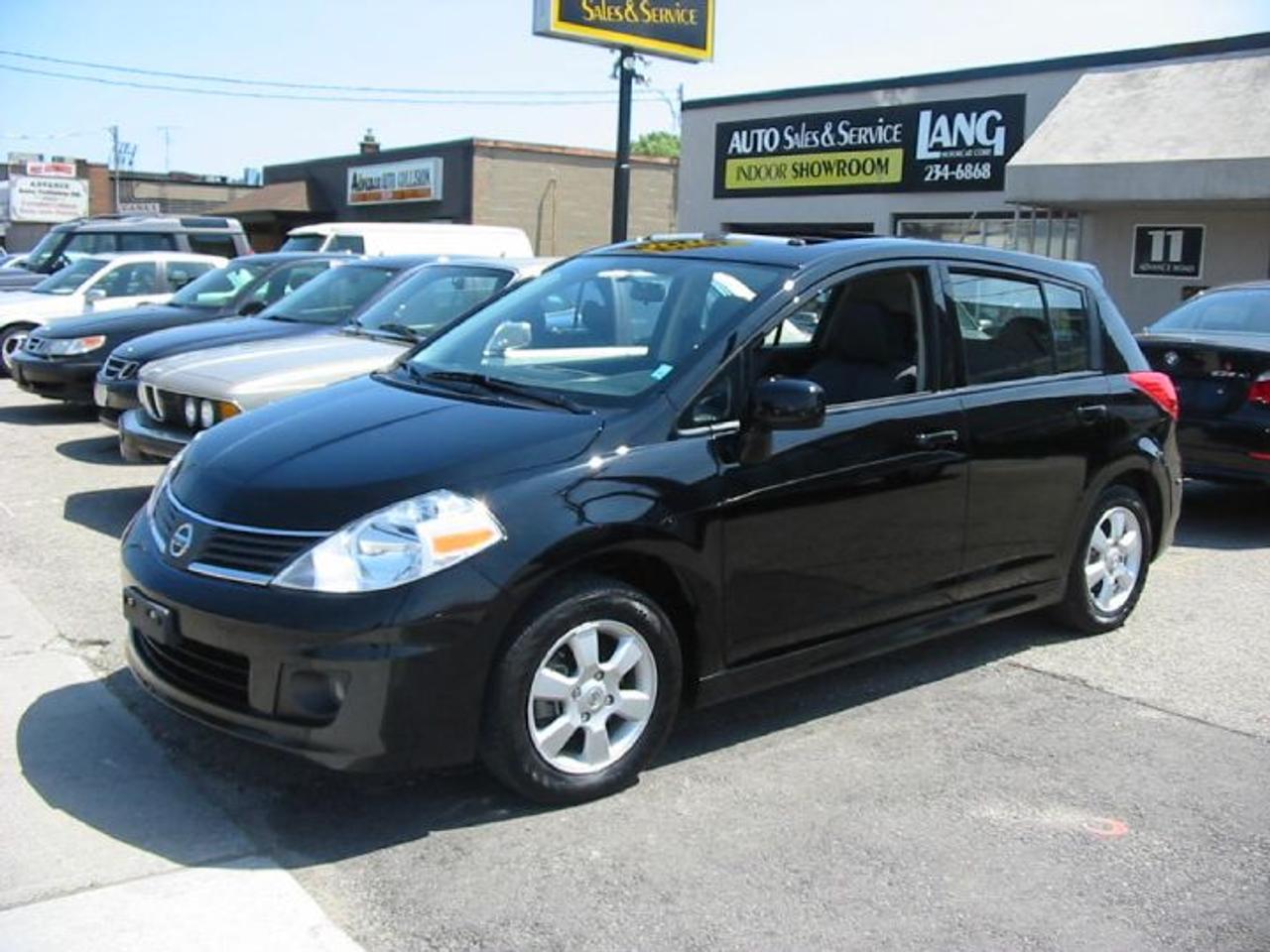 *NO BOGUS HIDDEN FEES* CAR PROOF VERIFIED! DARE TO COMPARE ON THIS LOW MILEAGE, TOP OF THE LINE, VERSA SL HATCHBACK IN A RARE SIX SPEED MANUAL WITH SPORT PACKAGE AND TECHNOLOGY PACKAGE! IN IMMACULATE BLACK ON GREY CLOTH UPGRADED SPORT SEATS, POWER MOONROOF, ALLOYS, POWER WINDOWS, IN DASH CD CHANGER, BLUE TOOTH AND SO MUCH MORE! ONLY 38,000KMS! WILL BE SOLD CERT. AND E-TESTED FOR $13990 PLUS HST AND LICENSE!WE ARE A LUBRICO WARRANTY APPROVED SERVICE FACILITY FOR ALL MAKES AND MODELS ( $ 79 PER HOUR LABOUR RATE )