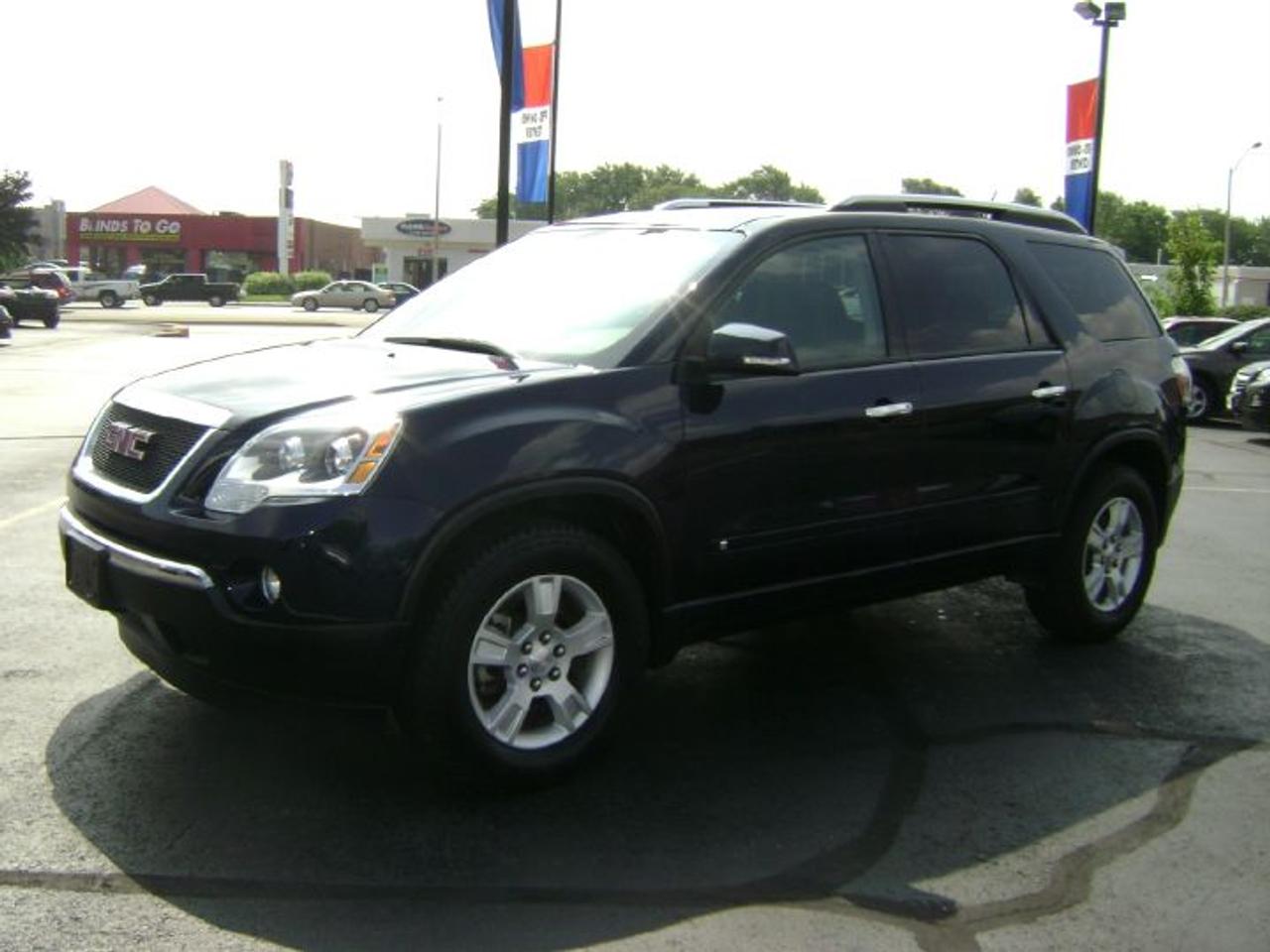 THIS IS LOADED WITH EQUIPMENT...BLUETOOTH, REAR PARK ASSIST, QUAD CAPT CHAIR SEATING, REMOTE STARTER, CHROME PACKAGE, FRONT AND REAR AIR AND HEAT, STEERING WHEEL MOUNTED CONTROLS, ANTI LOCK BRAKES, DUAL FRONT POWER SEATS, ONSTAR, XM RADIO.... PRICE IS PLUS GST/PST AND LICENSE ONLY.