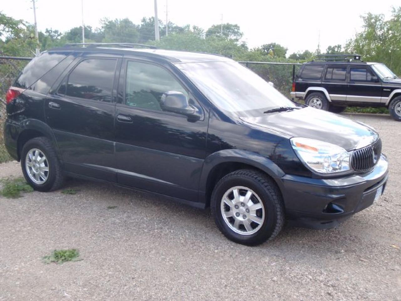 2004 Buick Rendezvous CX - Certified / E-tested! 
Black on grey cloth interior, V6, 4 door, 160kms, loaded with keyless entry, power windows, power door locks, power steering, tilt, cruise, am/fm/cd player, dual air bags, 5 passenger seating, roof rack, privacy glass, runs and drives like new! Asking $6,999.00 + HST! Certified / E-tested! WE FINANCE!