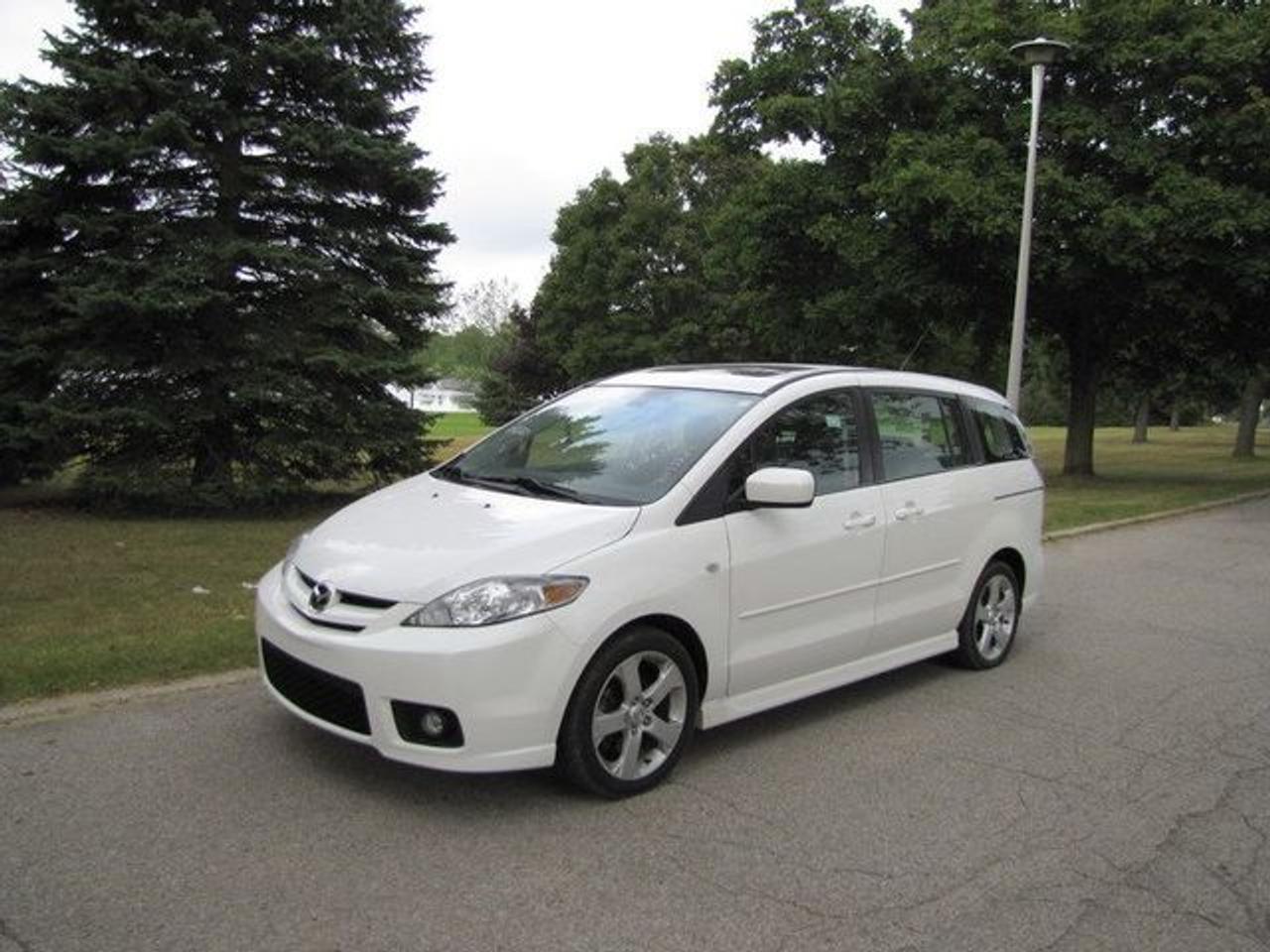This 2007 Mazda MAZDA5 4dr Ron GS SUNROOF!! ALLOYS!! MAZDA LEASE RETURN!! Wagon features a 2.3L L4 DOHC 16V 4 cyl Gasoline engine. It is equipped with a 5 Speed Manual transmission. The vehicle is White with a Black Cloth interior. It is offered with the remaining factory warranty. Over 400 BETTER used cars in stock!! PLEASE CALL 1-866-348-8146 5.99% Financing + no payments up to 6 months available on approved credit!! Free Trial Exchange!! A+ Better Business Bureau rating!! Voted Guelphs Favorite dealer 2004-2009!! Since 1961. Taxes, licensing, and $5.00 OMVIC fee are extra. Call for details on our Free Trial Exchange! Thank you for considering Wilsons!!! Please call 1-866-348-8146 - This Mazda is in Excellent overall exterior condition, Excellent overall interior condition, Cloth seats - Air Conditioning, Cruise Control, Power Steering, Power Windows, Power Door Locks, Power Mirrors, Clock, Tachometer, Digital Info Center, Tilt Steering Wheel, Telescoping Steering Wheel, Steering Wheel Radio Controls, Sunroof, Driver Airbag, Passenger Airbag, Keyless Entry, ABS Brakes, Rear Defogger, Fog Lights, Intermittent Wipers, AM-FM, CD Player, Alloy Wheels, Cloth Interior Surface - Contact The Internet Department at 866-738-6045 or leads@markwilsonsbetterusedcarstc.dealer.com for more information. -