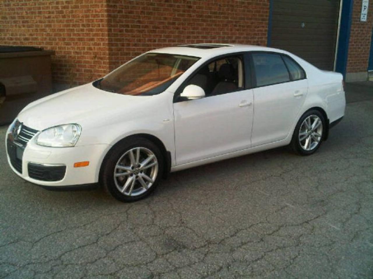 <p>Literally BRAND NEW CONDITION!!!! Hard to get and long sold out WOLFSBURG EDITION in Candy White on Black Interior. Features Include: 2.0 Litre Turbo Engine with 200 Horsepower, 6-Speed Manual, SIRIUS Satelite MP3 Touch Screen Stereo, Front Fog Lights, Power Sunroof, Front and Side Airbags, ABS, and so much more!!!! Cant get anymore from Volkswagen deals as they sold out of this model a while ago now!!! Balance of factory warranties apply. CAR PROOF CLEAN, All Original like NEW and only 6500 km!!! Please message me with a phone number for further details.UCDA member and OMVIC Registered Dealer!!!</p>