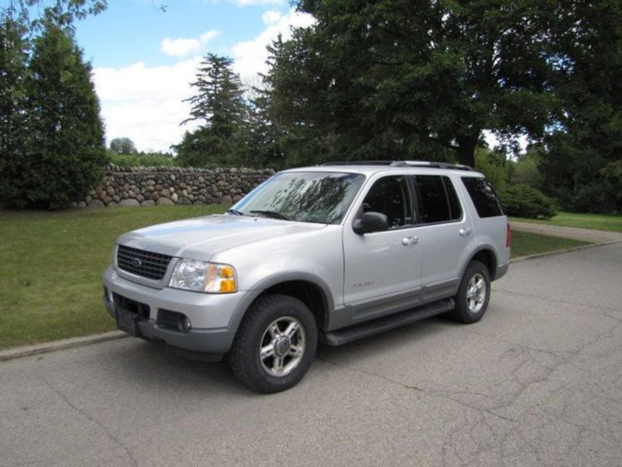 This 2002 Ford Explorer 4dr XLT 4X4 ALLOYS-BOARDS!! 7 PASSENGER!! AS-IS!! SUV features a 4.6L V8 FI SOHC 16V 8 cyl Gasoline engine. It is equipped with a Automatic transmission. The vehicle is Silver with a Grey Cloth interior. Over 400 Better used cars in stock!! PLEASE CALL 1-866-348-8146 A+ Better Business Bureau rating!! Voted Guelphs Favourite dealer 2004-2009!! Since 1961. Taxes, licensing and $5.00 OMVIC fee are extra. WE ARE SELLING THIS ONE "AS IS" and we are required by law to state, even if this vehicle is perfect: &ldquo;Vehicle is not in roadworthy condition, not certified and not e-tested.&rdquo; THIS VEHICLE MAY EVEN HAVE MANUFACTURERS WARRANTY, AND IT MAY BE THE CAR FOR YOU, AT A PRICE YOU CAN AFFORD!!! - This Ford is in Excellent overall exterior condition, Excellent overall interior condition, Cloth seats - Air Conditioning, Climate Control, Cruise Control, Power Steering, Power Windows, Power Door Locks, Power Mirrors, Power Drivers Seat, Tow Package, Roof Rack, Rear Air Conditioning, Clock, Tachometer, Digital Info Center, Tilt Steering Wheel, Driver Airbag, Passenger Airbag, Keyless Entry, ABS Brakes, Rear Defogger, Intermittent Wipers, AM-FM, CD Player, Alloy Wheels, Cloth Interior Surface, Four Wheel Drive - Contact The Internet Department at 866-738-6045 or leads@markwilsonsbetterusedcarstc.dealer.com for more information. -
