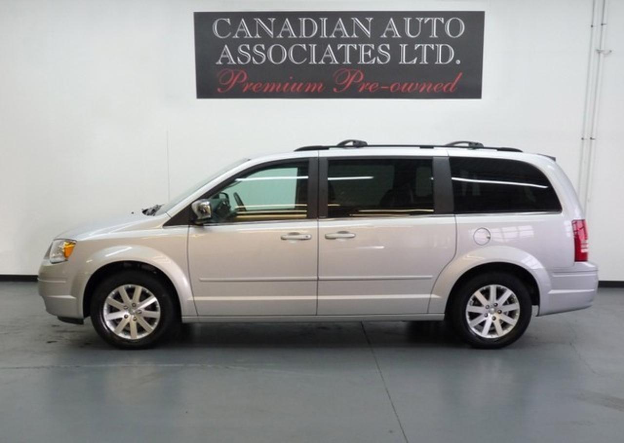 ONE OWNER!!!! Options include: Quad Seating, Stow N Go, Power Driver Seat, Dual Zone Climate Control, Rear Heat/Air, Dual Power Sliding Doors, Power Liftgate, Power Adjustable Pedals, Universal Garage Door Opener, 6 Disc CD/MP3, Privacy Glass, Woodgrain Interior Accents, Keyless Entry, Power Windows/Locks/Mirrors and more. Premium Pre-Owned Certified. The balance of Manufacturers warranty applies. We offer flexible finance options with top trade allowances. Contact one of our sales professionals regarding this opportunity !!! Visit our website to view 20+ photos & FREE CARFAX with a buy back guarantee.  www.canadianautoassociates.com  No Hidden Fees: Advertised Price +HST +Lic.  Vehicle equipped as photographed and demonstrated.