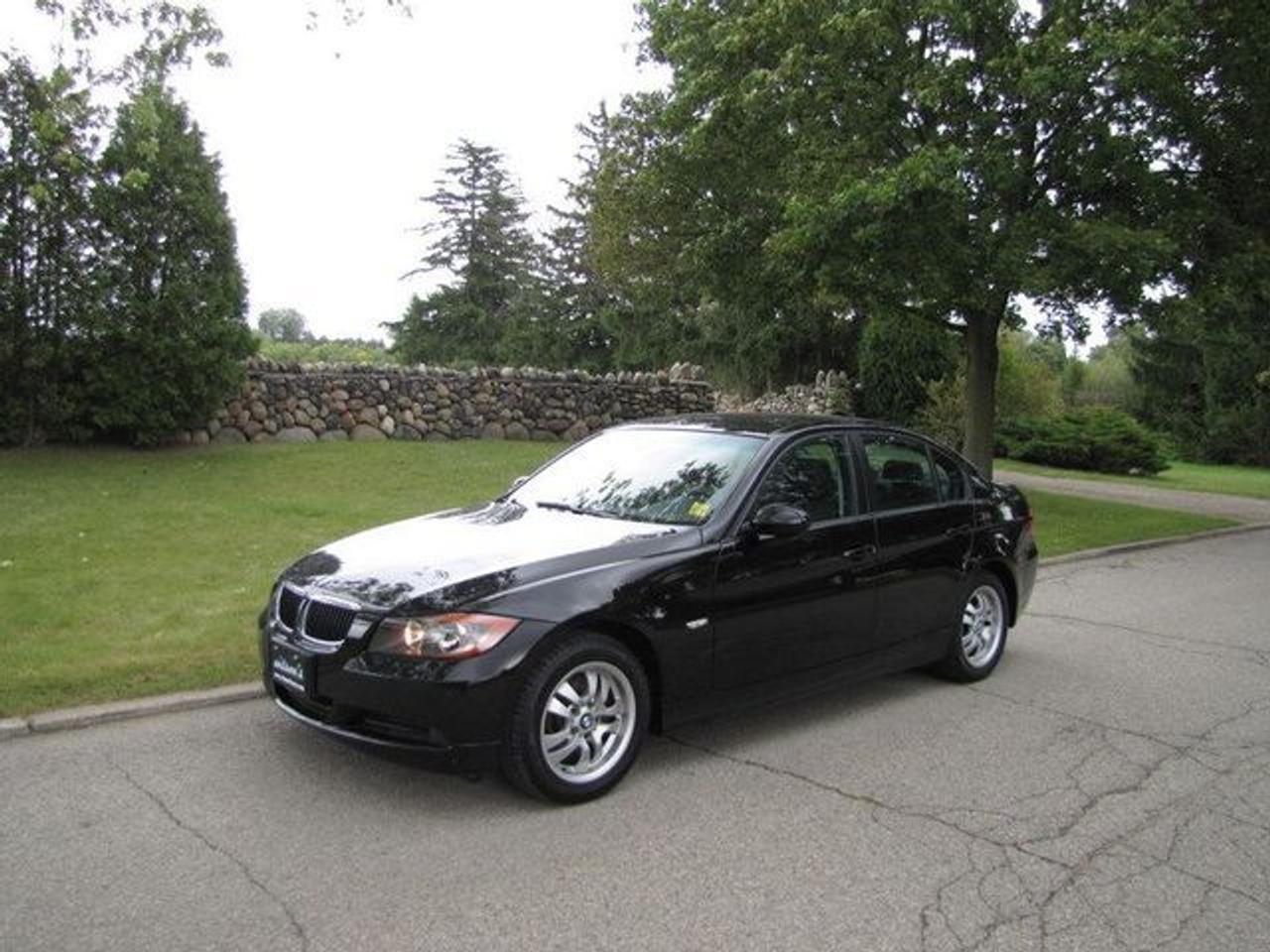 This 2007 BMW 3 Series 4dr 323i HEATED SEATS!! LEATHER!! BLACK-BLACK!! Sedan features a 2.5L L6 FI DOHC 24V 6 cyl Gasoline engine. It is equipped with a 6 Speed Manual transmission. The vehicle is Black with a Black Leather interior. It is offered with the remaining factory warranty. Over 400 BETTER used cars in stock!! PLEASE CALL 1-866-348-8146 5.99% Financing + no payments up to 6 months available on approved credit!! Free Trial Exchange!! A+ Better Business Bureau rating!! Voted Guelphs Favourite dealer 2004-2009!! Since 1961. Taxes, licensing, and $5.00 OMVIC fee are extra. Call for details on our Free Trial Exchange! Thank you for considering Wilsons!!! Please call 1-866-348-8146. - This BMW is in Excellent overall exterior condition, Excellent overall interior condition, Leather seats - Air Conditioning, Climate Control, Cruise Control, Power Steering, Power Windows, Power Door Locks, Power Mirrors, Leather Steering Wheel, Heated Seat, Clock, Tachometer, Digital Info Center, Tilt Steering Wheel, Steering Wheel Radio Controls, Driver Airbag, Passenger Airbag, Keyless Entry, ABS Brakes, Traction Control, Rear Defogger, Intermittent Wipers, AM-FM, CD Player, Alloy Wheels, Leather Interior Surface - Contact The Internet Department at 866-738-6045 or leads@markwilsonsbetterusedcarstc.dealer.com for more information. -